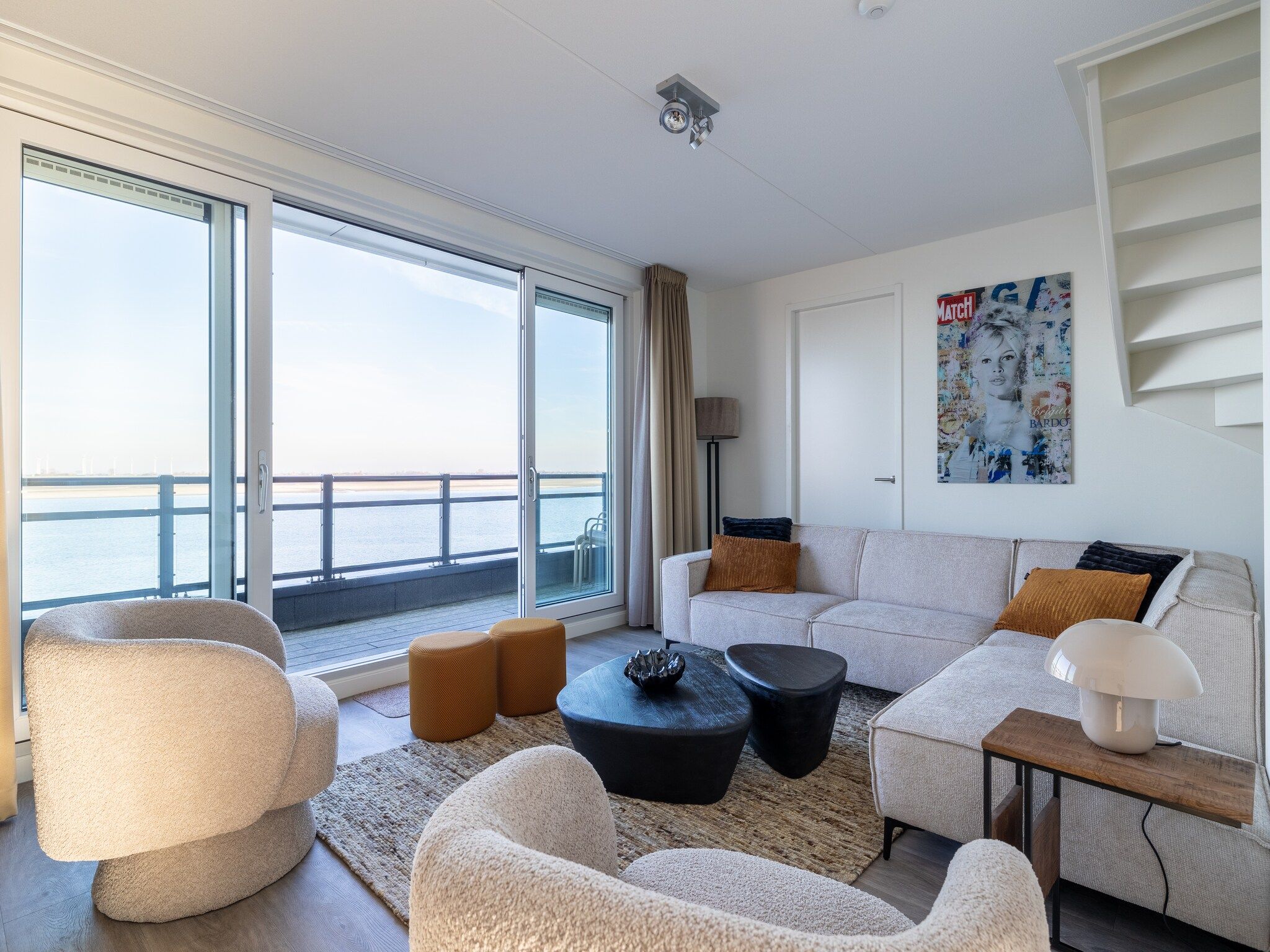 De woonkamer van Appartement Vista Maris 'Haus am See' - Havenweg 8-30  Sint-Annaland in Sint-Annaland