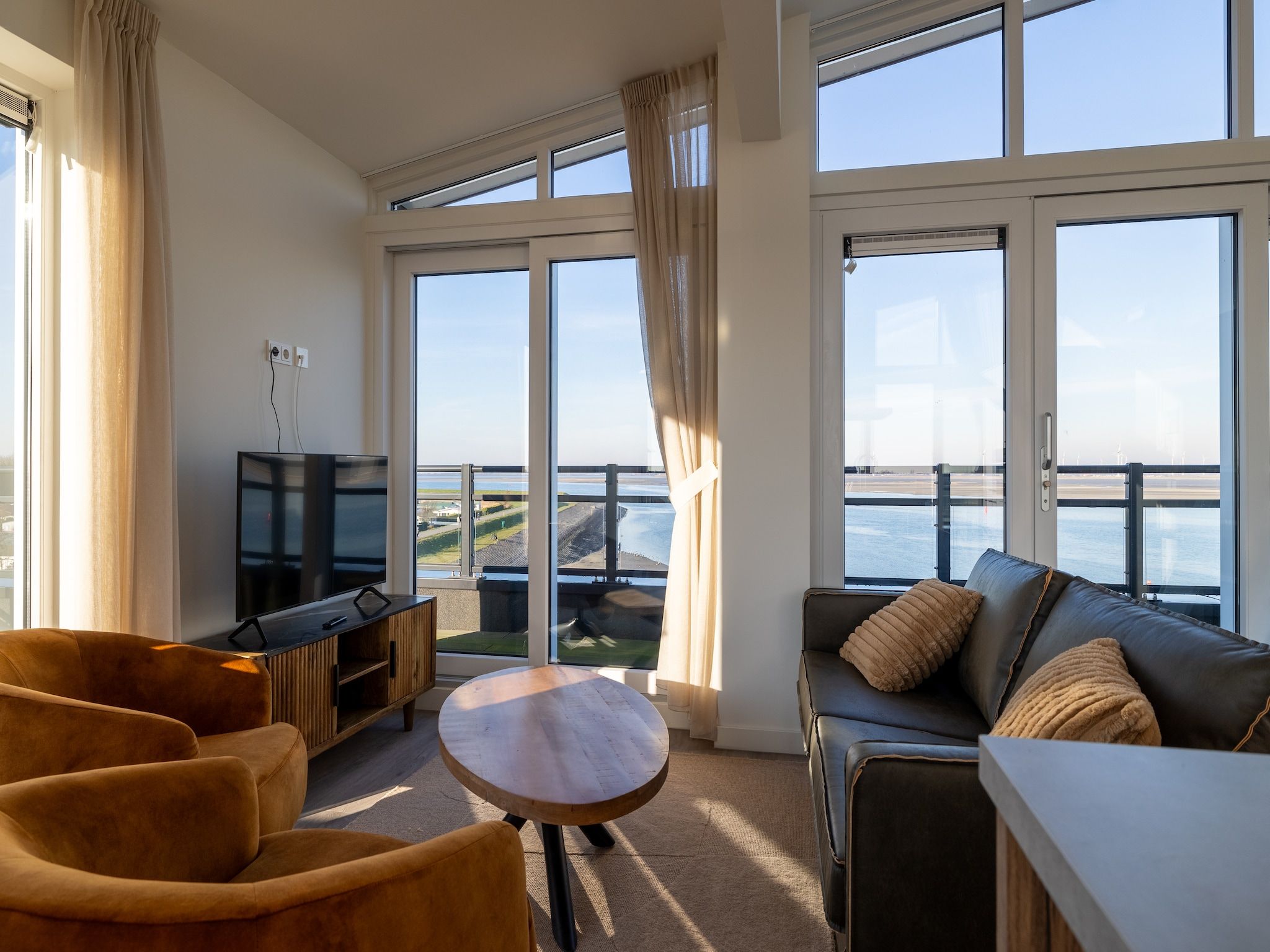 De woonkamer van Appartement Vista Maris - Havenweg 8-48  Sint-Annaland in Sint-Annaland