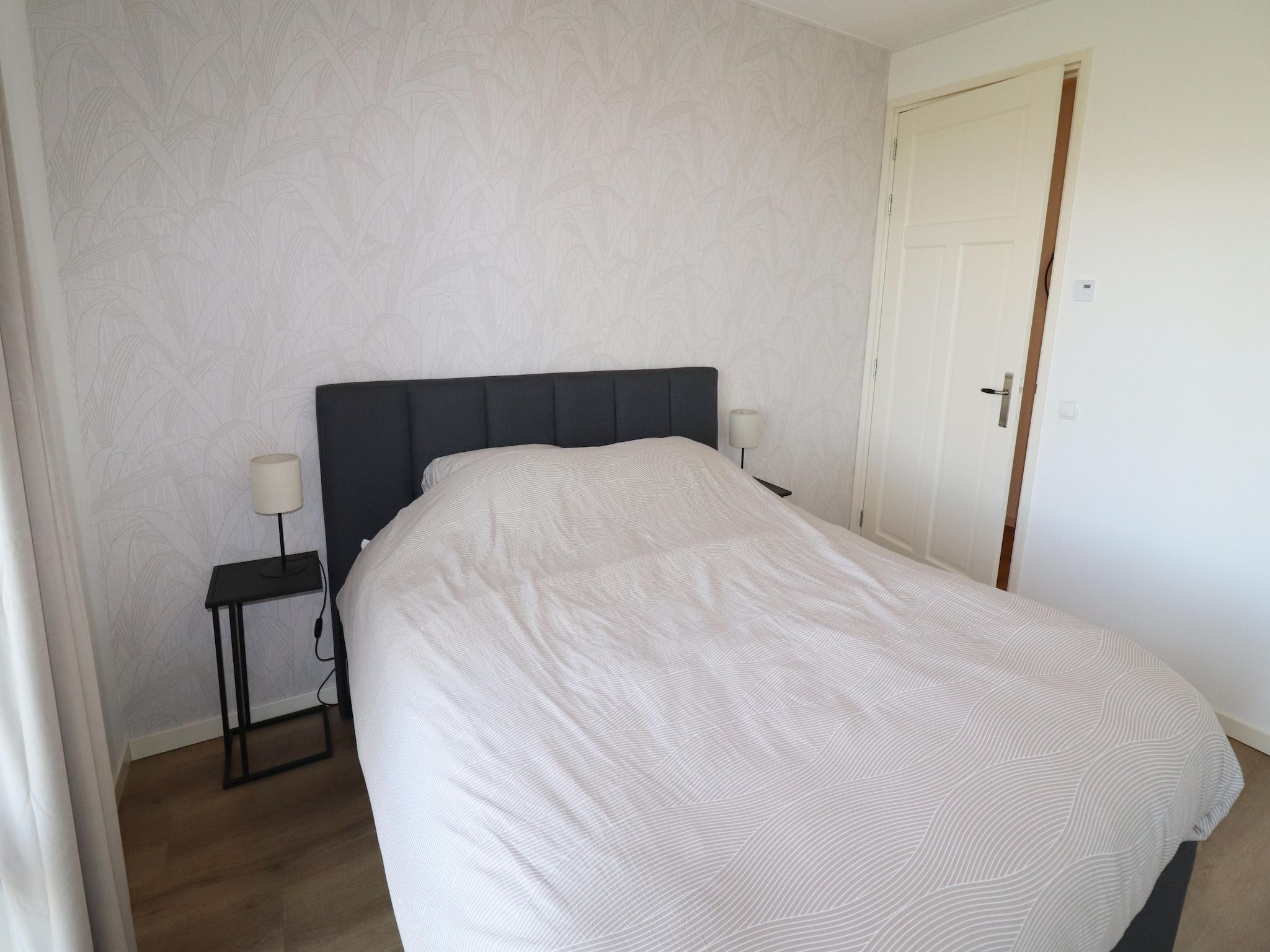Een slaapkamer van Berkenhof appartment in Workum