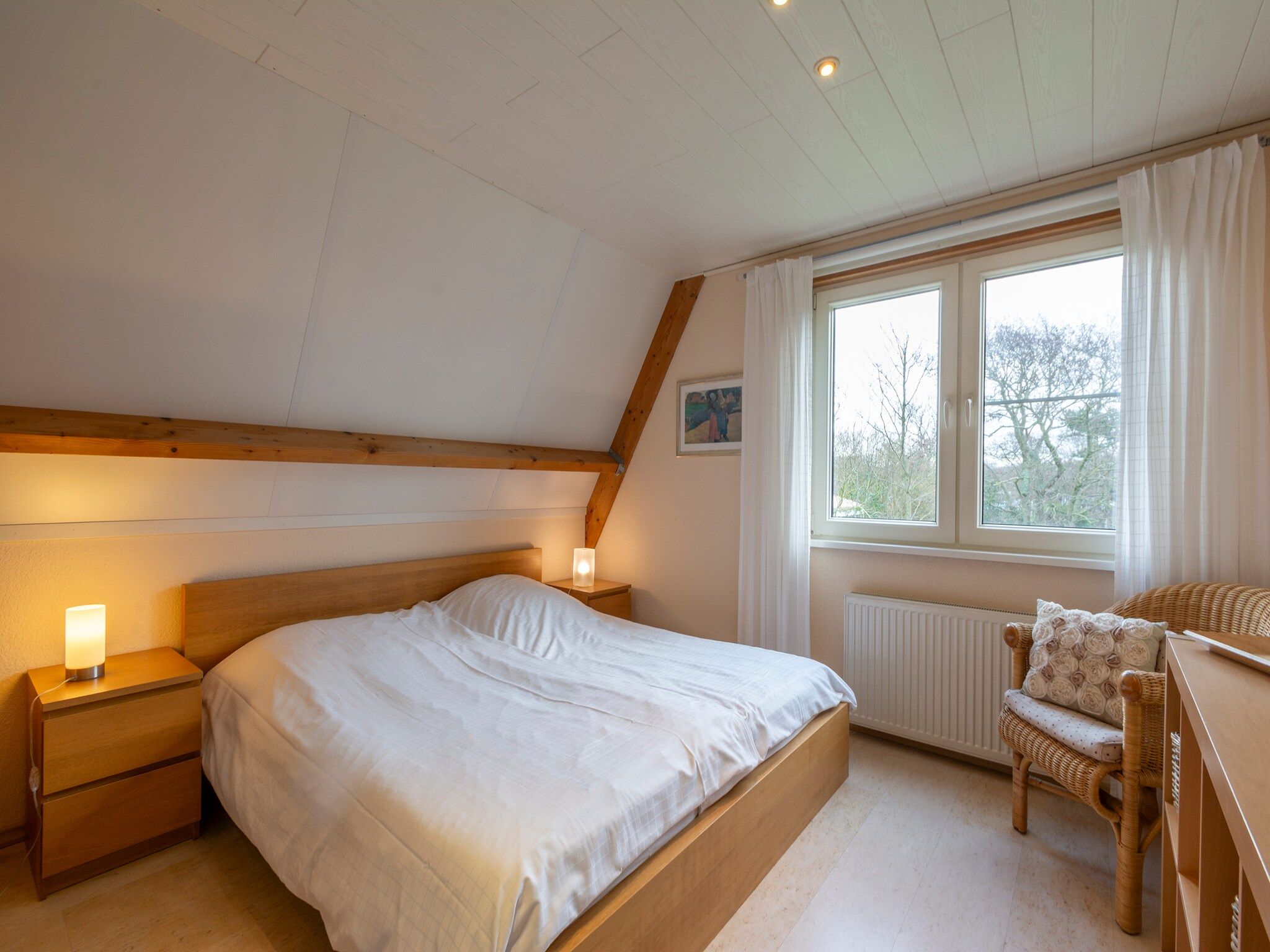 Een slaapkamer van Garnekuul 15 in Callantsoog