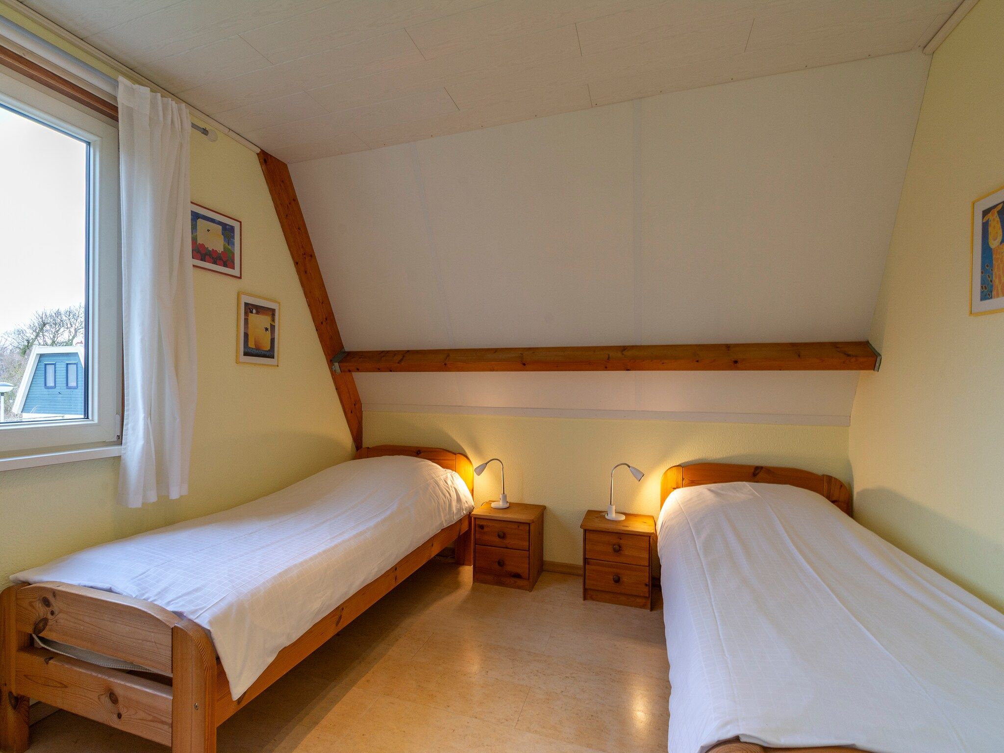 Een slaapkamer van Garnekuul 15 in Callantsoog