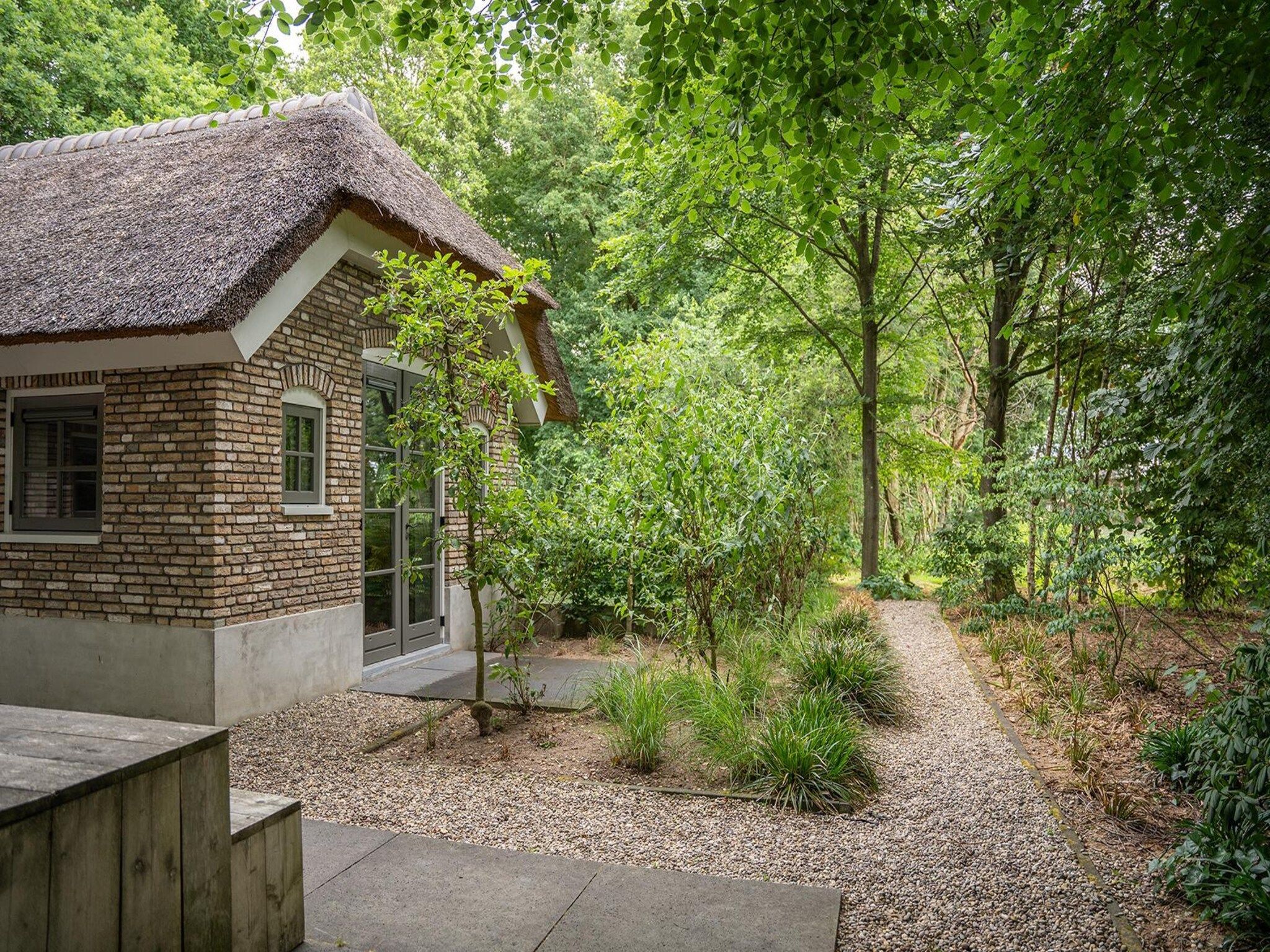 De buitenkant van Vlindervallei Boshuis 16p in Ermelo