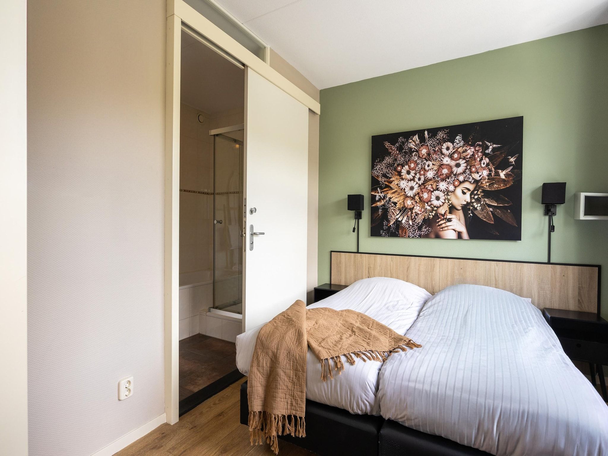 Een slaapkamer van Andijk 15 in Andijk