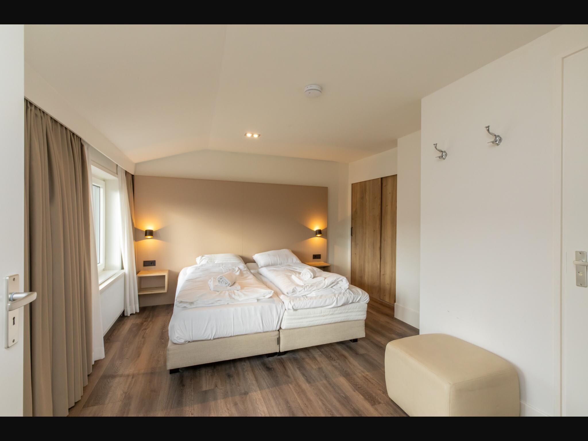 Een slaapkamer van Overnachten in Zoutelande  Comfortabel Appartement Langstraat 5A in Zoutelande
