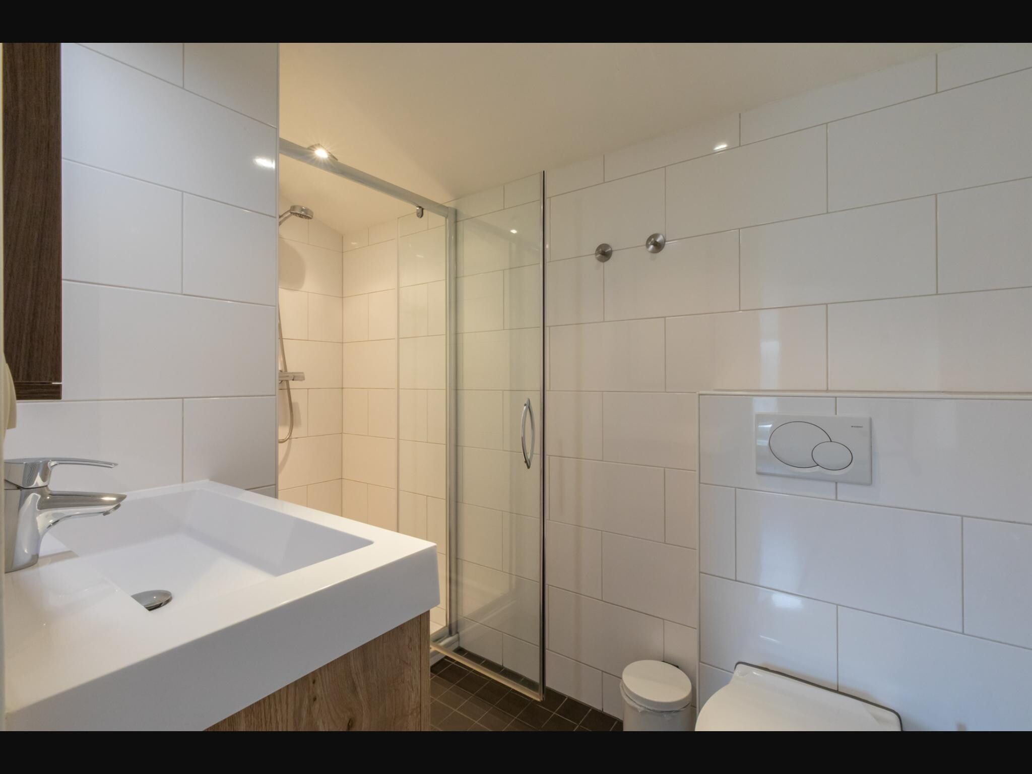 De badkamer van Overnachten in Zoutelande  Comfortabel Appartement Langstraat 5A in Zoutelande