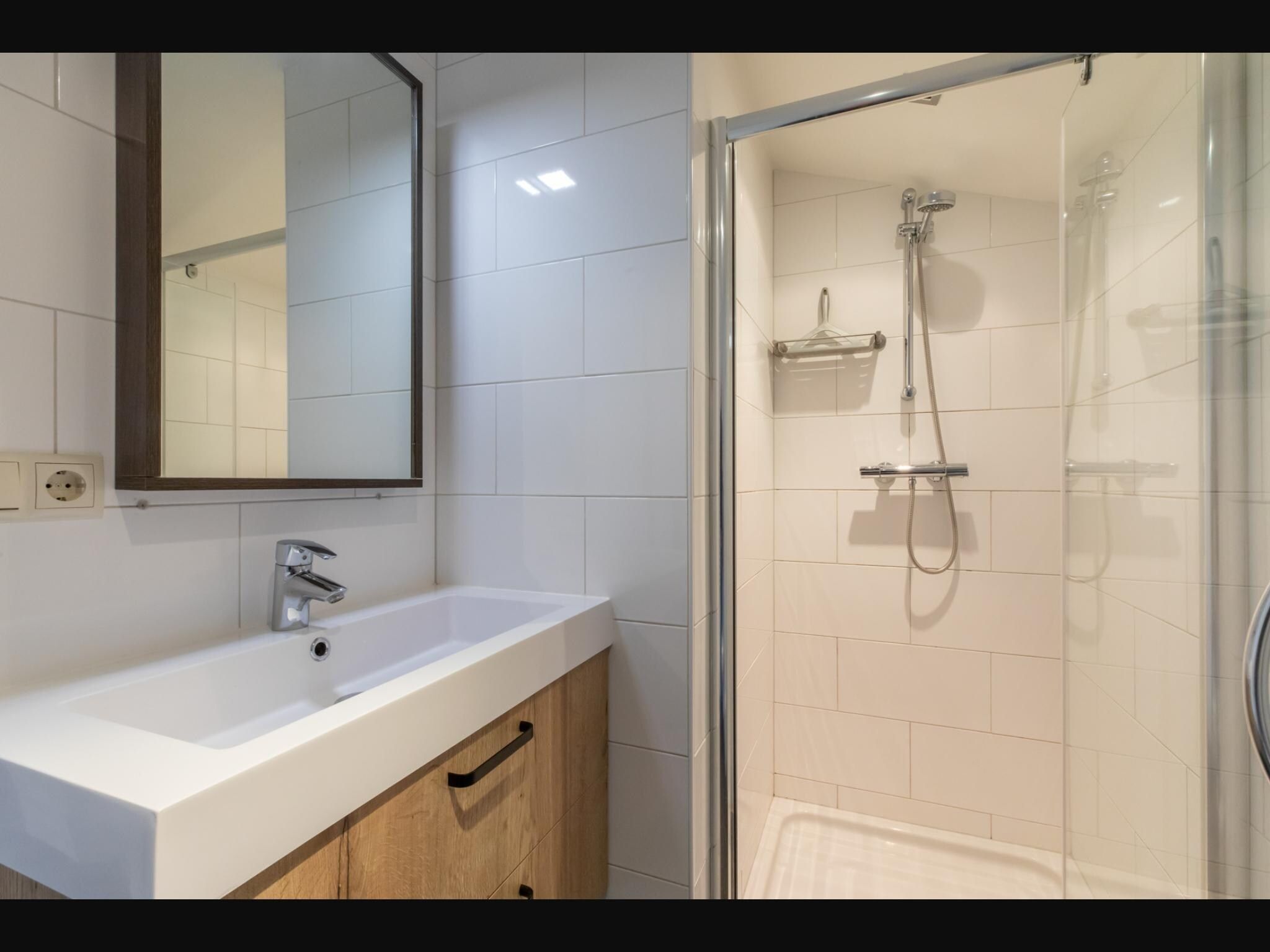 De badkamer van Overnachten in Zoutelande  Comfortabel Appartement Langstraat 5A in Zoutelande