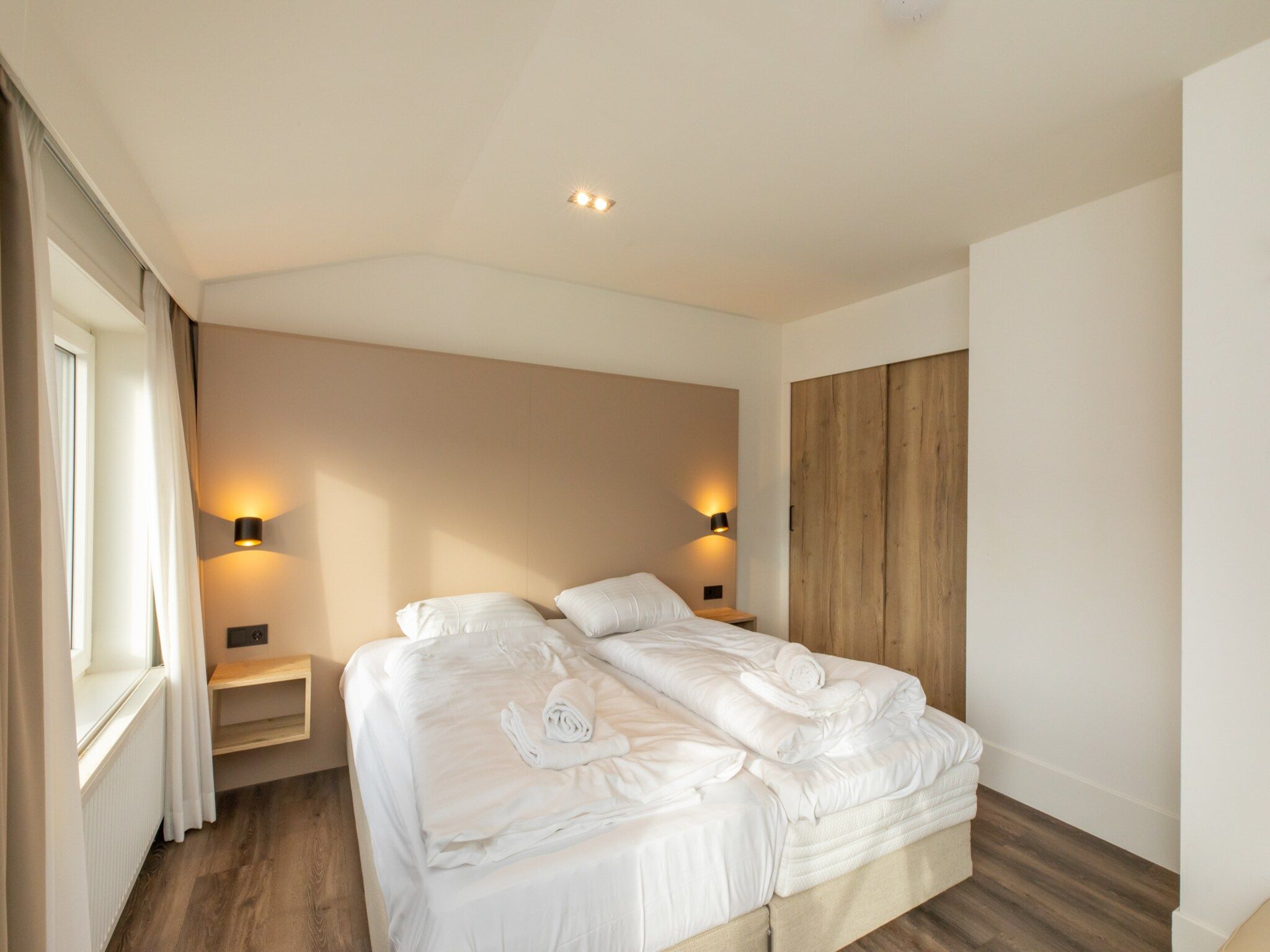 Een slaapkamer van Overnachten in Zoutelande  Comfortabel Appartement Langstraat 5A in Zoutelande