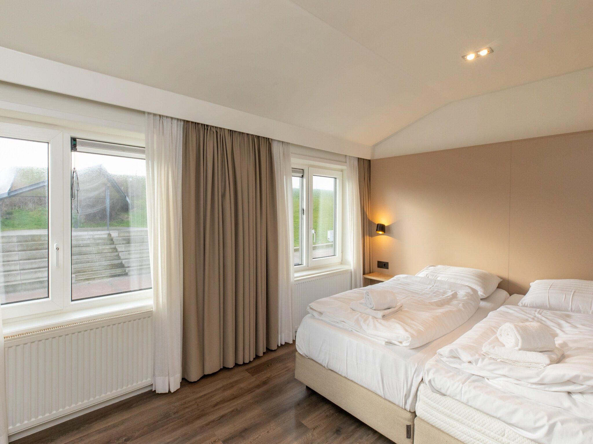 Een slaapkamer van Overnachten in Zoutelande  Comfortabel Appartement Langstraat 5A in Zoutelande