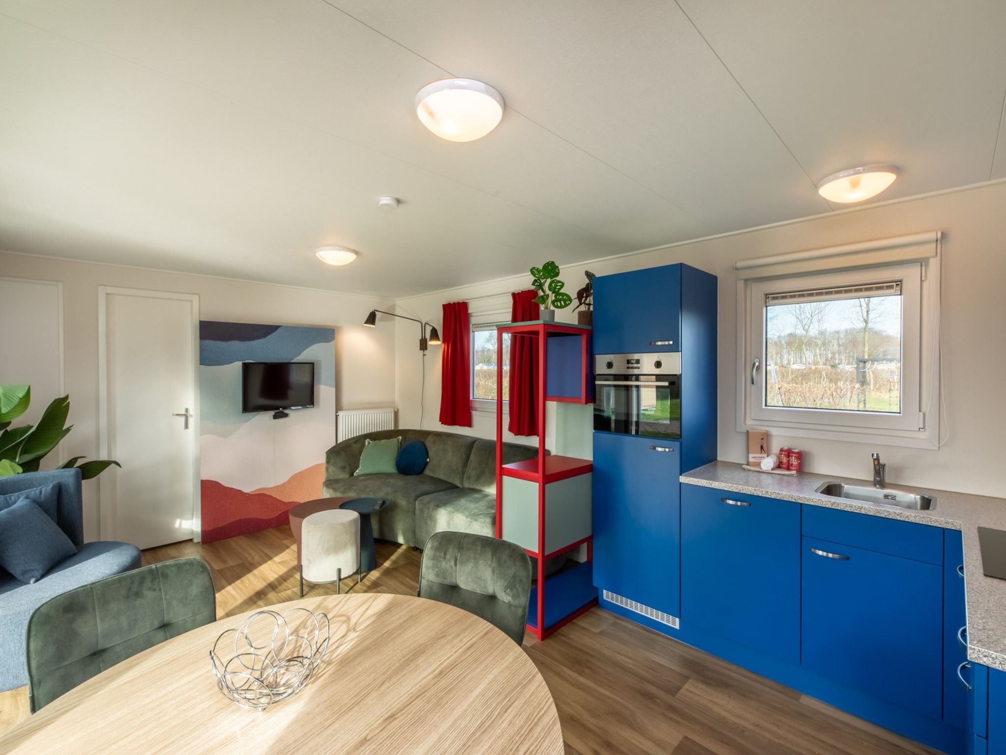 De woonkamer van Chalet - Camping de Duinhoeve 'Bosdier' in Burgh-Haamstede