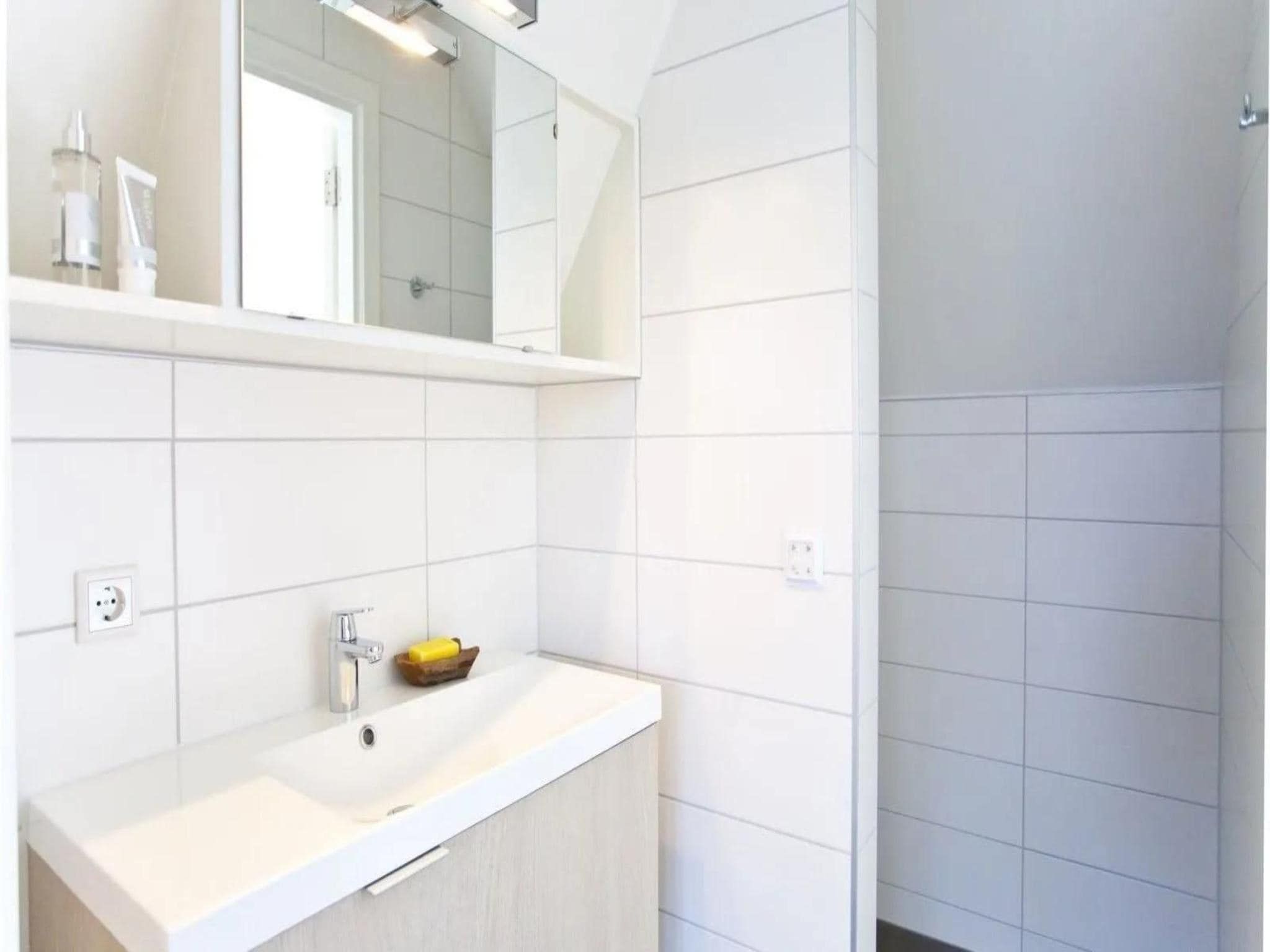 De badkamer van Group accommodation 20 in Otterlo
