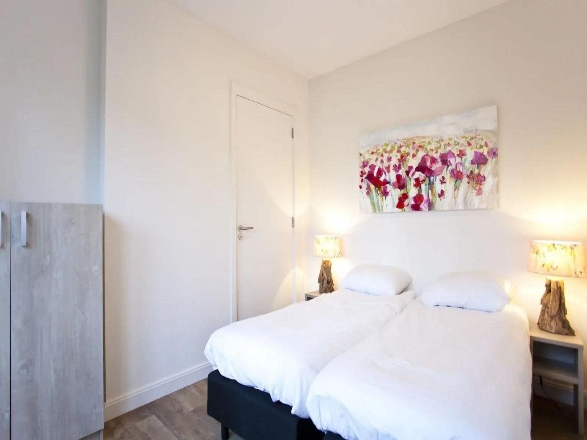 Een slaapkamer van Group accommodation 20 in Otterlo
