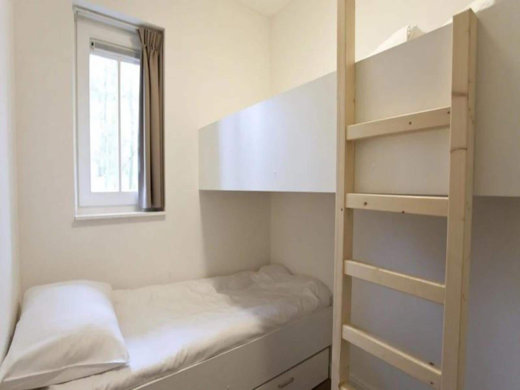 Een slaapkamer van Group accommodation 20 in Otterlo