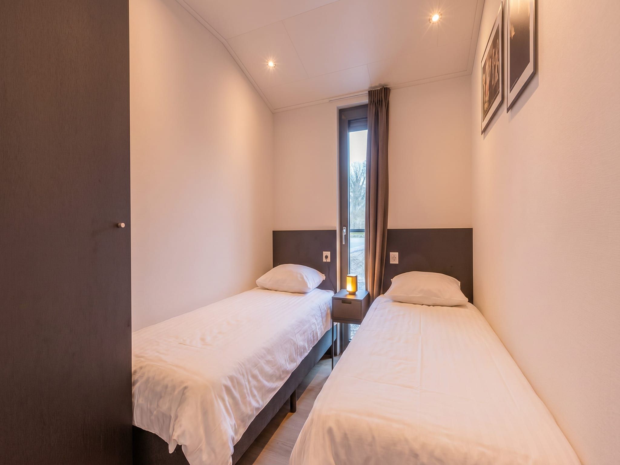 Een slaapkamer van Cube Split Culinair Sauna 4 in Enkhuizen