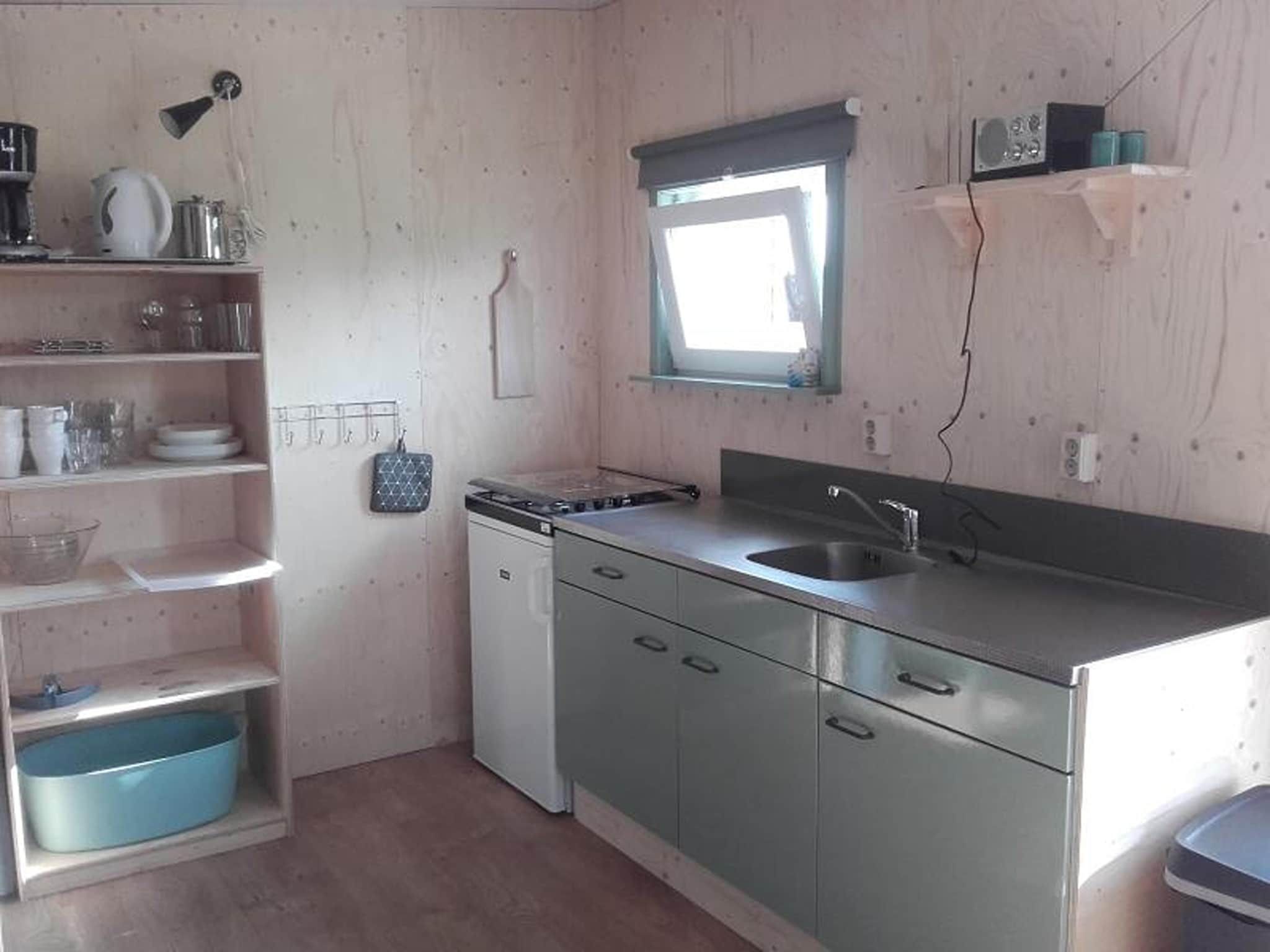 De keuken van Cosy cabin 2 in Heeg
