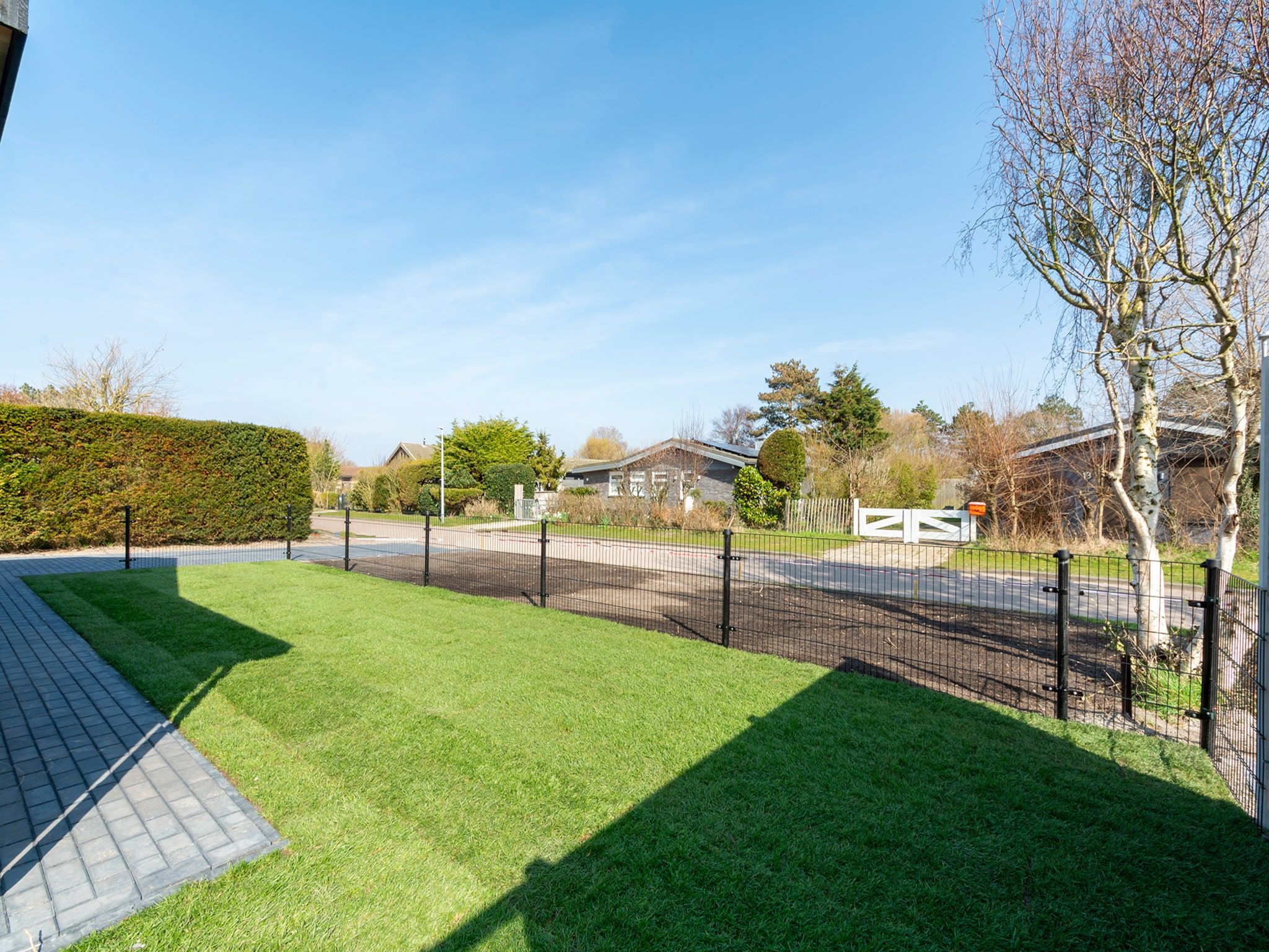 De tuin van Wellness Villa Azure in Julianadorp