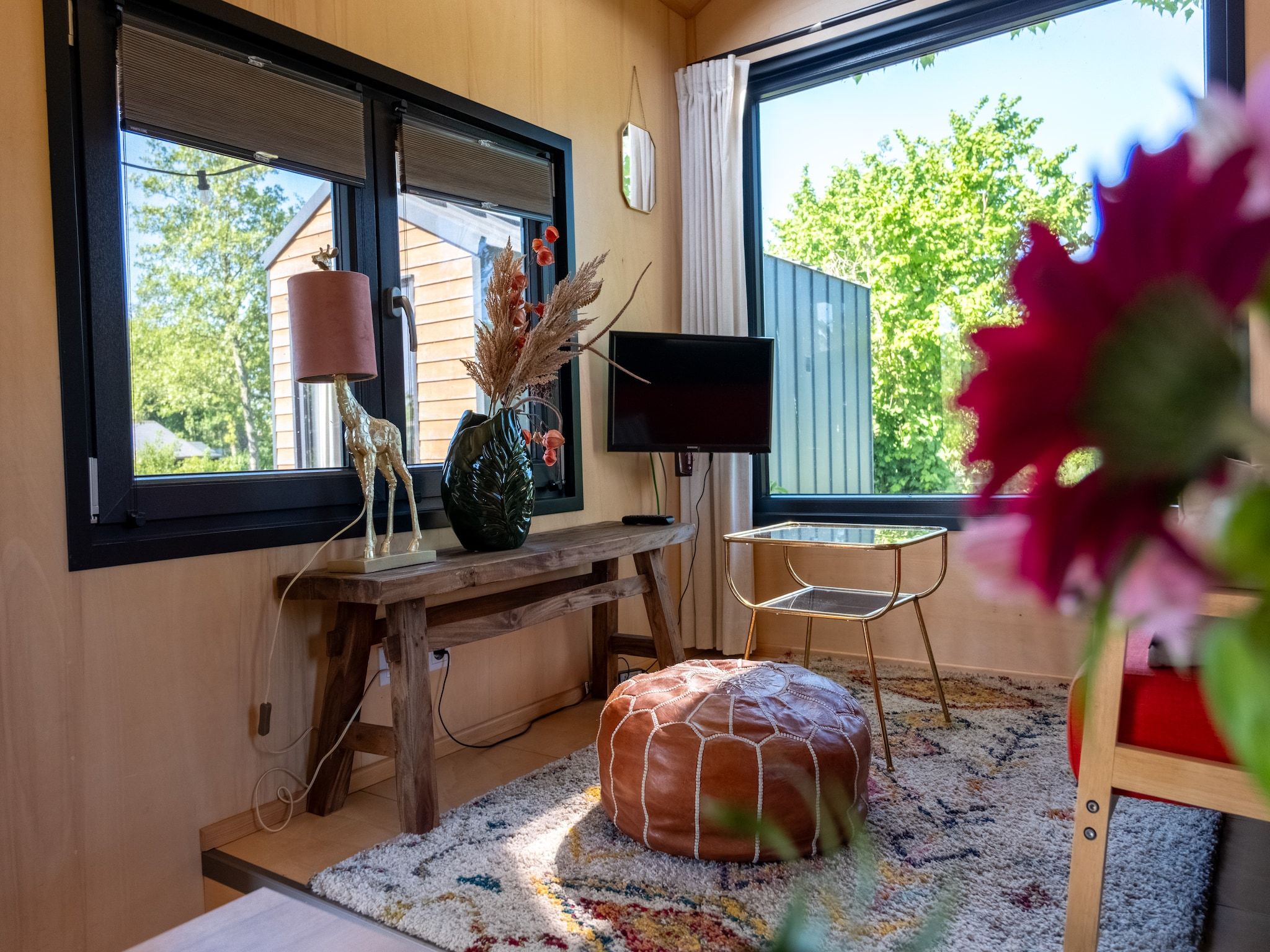 De woonkamer van Tiny house voor 2  2 personen in Scherpenzeel