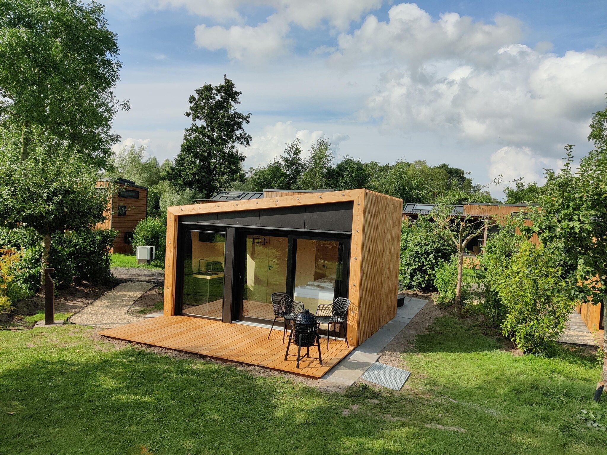 Het uitzicht vanaf Wetland Cabin 2 persoons (op Boetiekpark de Kas, Scherpenzeel, Friesland) in Scherpenzeel