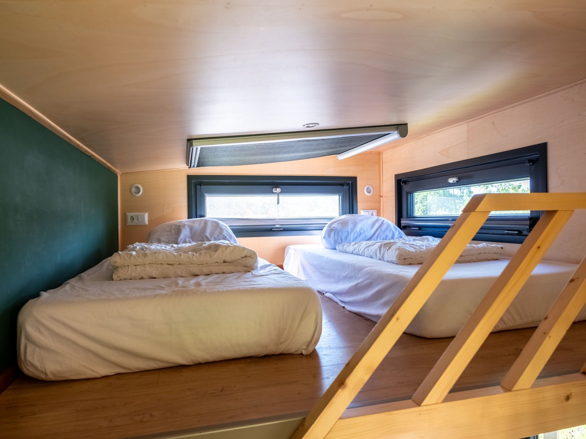 Een slaapkamer van Groepsruimte i.c.m. 4 tiny greenhouses in Scherpenzeel