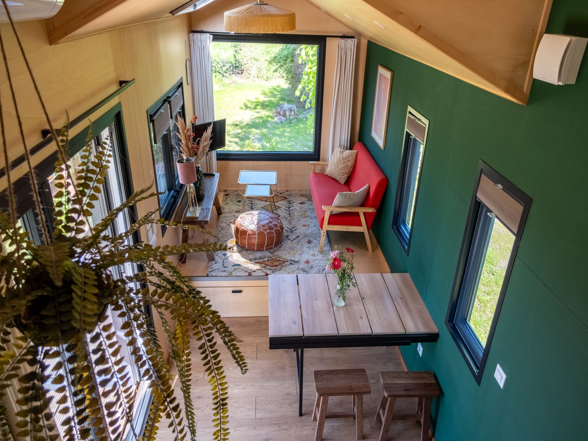 De woonkamer van Groepsruimte i.c.m. 4 tiny greenhouses in Scherpenzeel