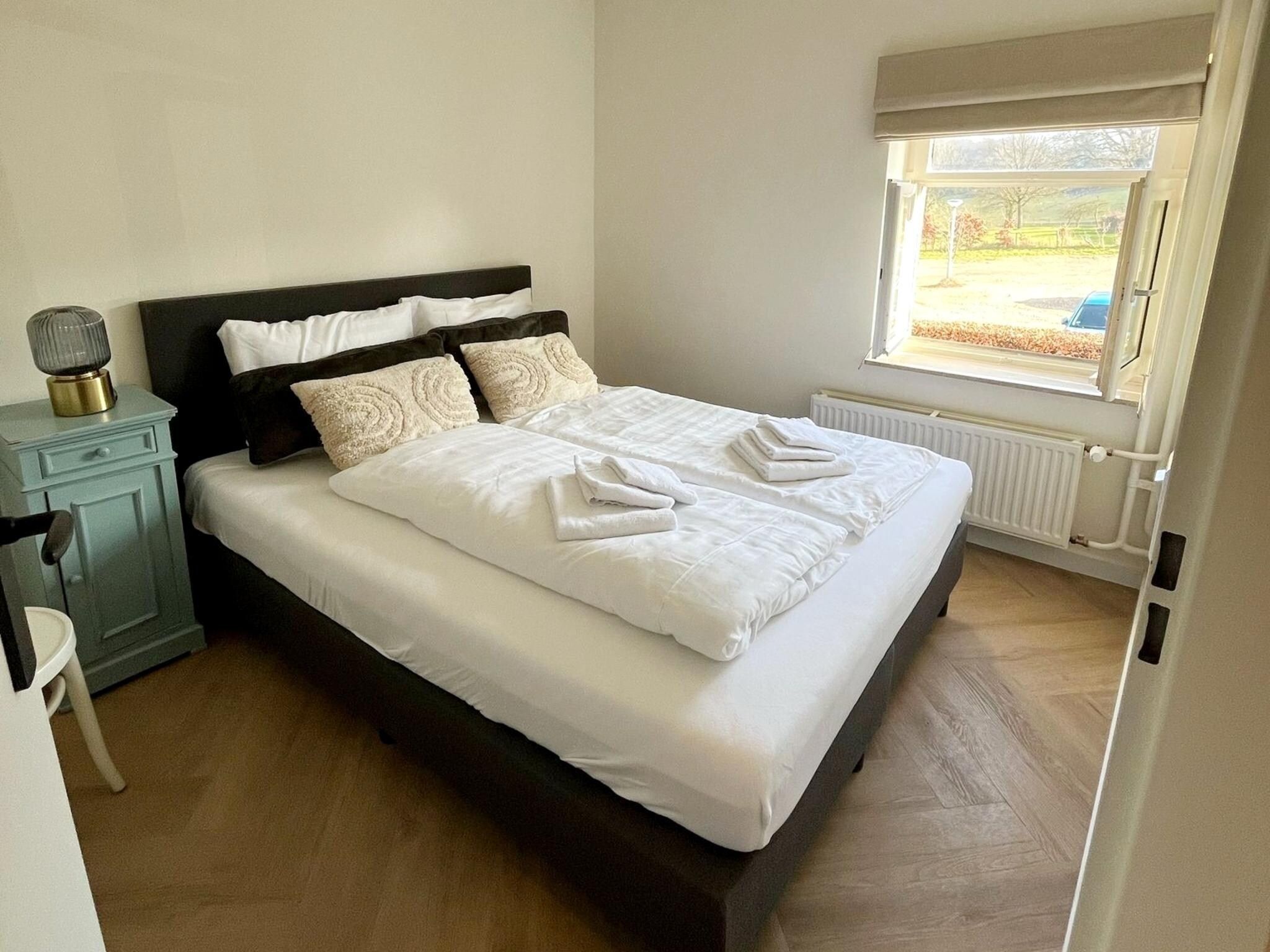Een slaapkamer van Valleyview Cottages - NR07 in Voerendaal