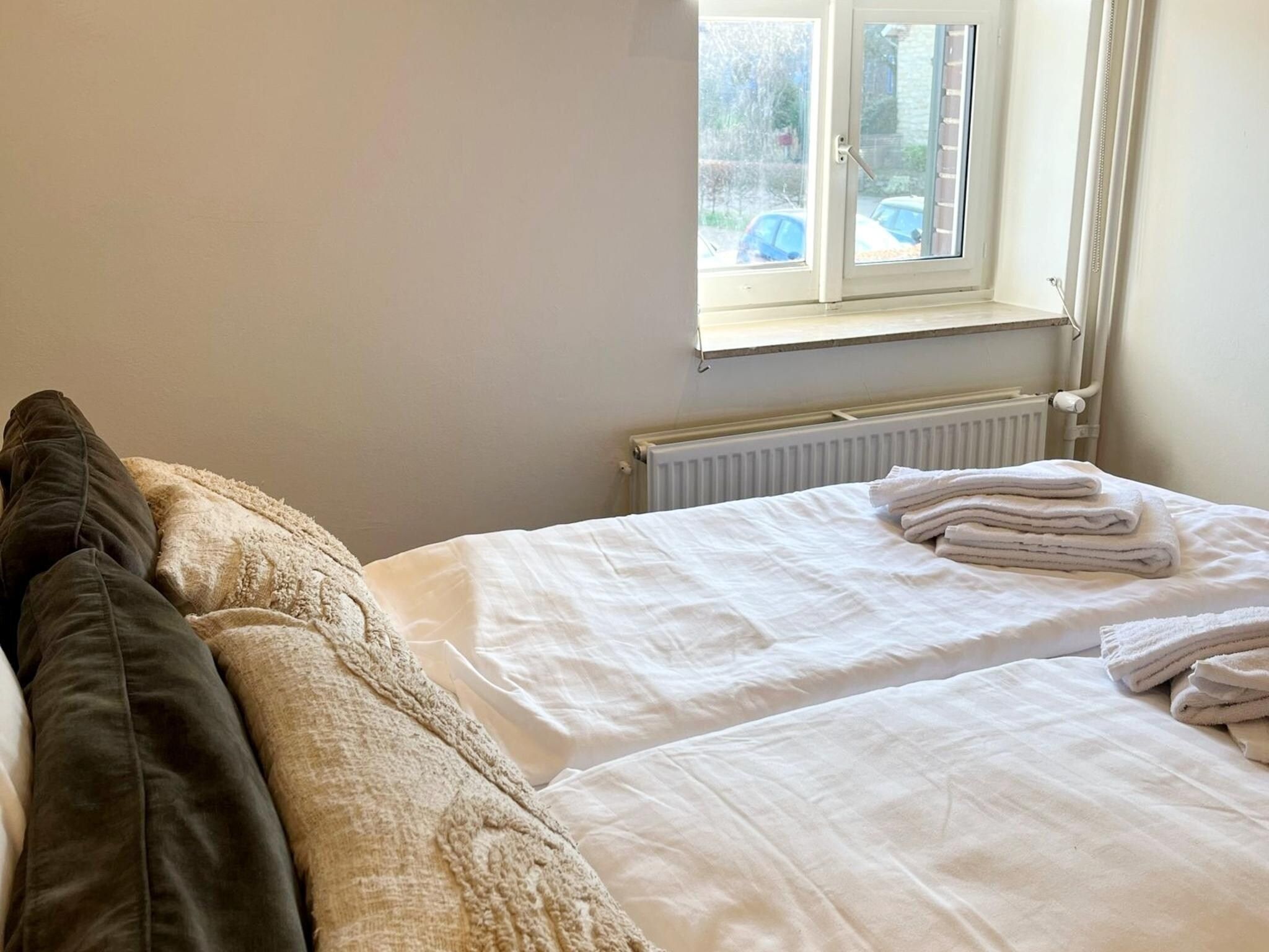 Een slaapkamer van Valleyview Cottages - NR07 in Voerendaal