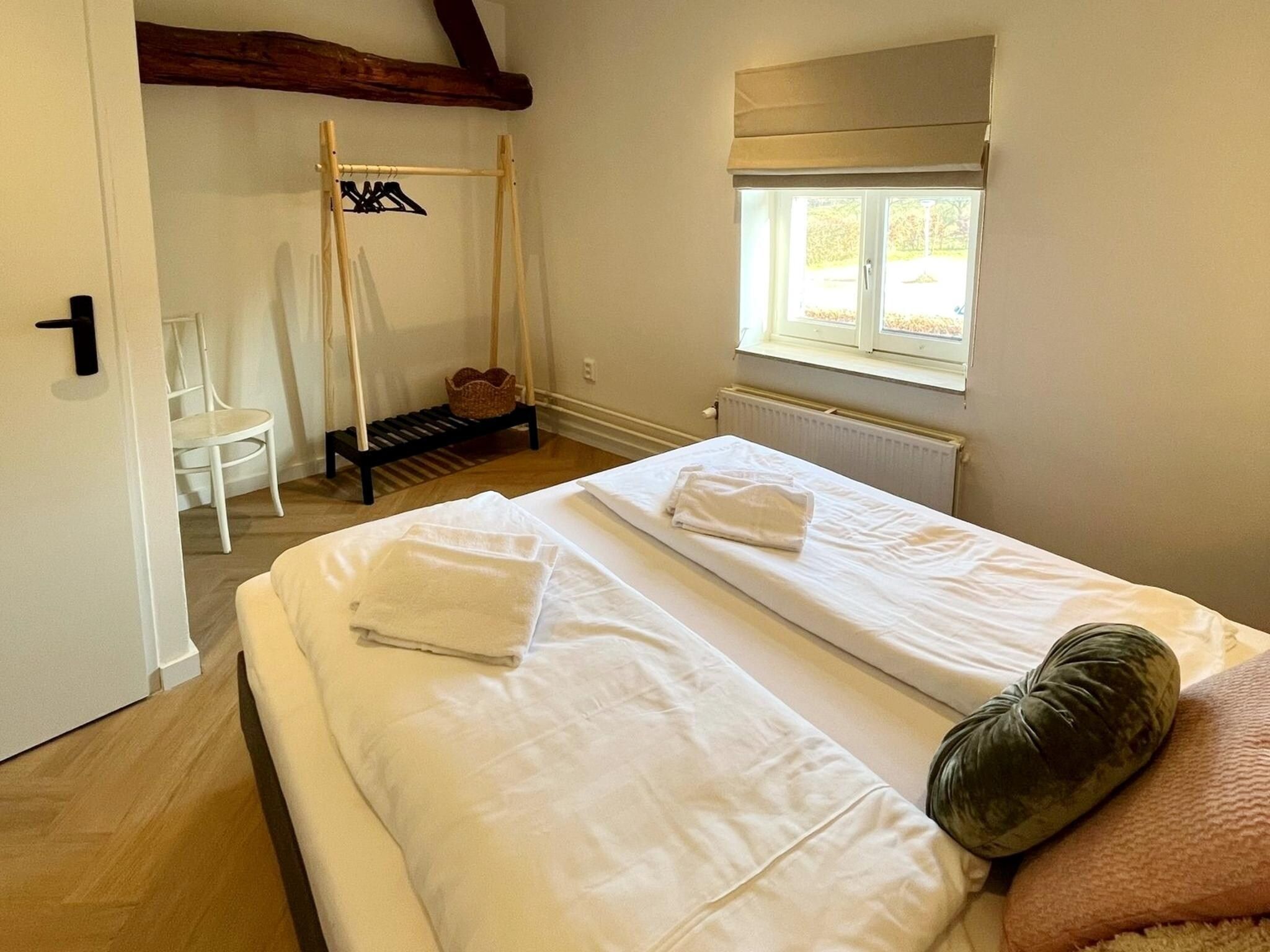 Een slaapkamer van Valleyview Cottages - NR07 in Voerendaal