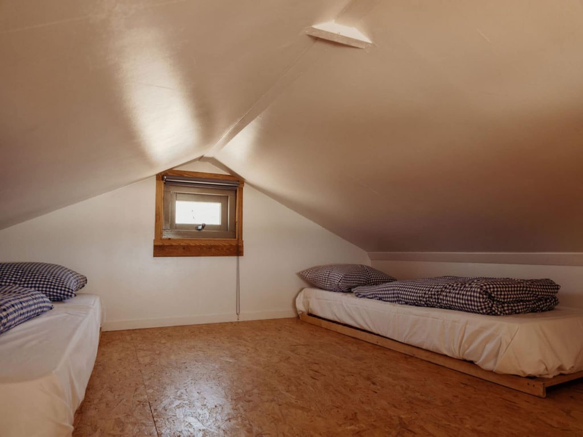 Een slaapkamer van Zeehut Petten in Petten
