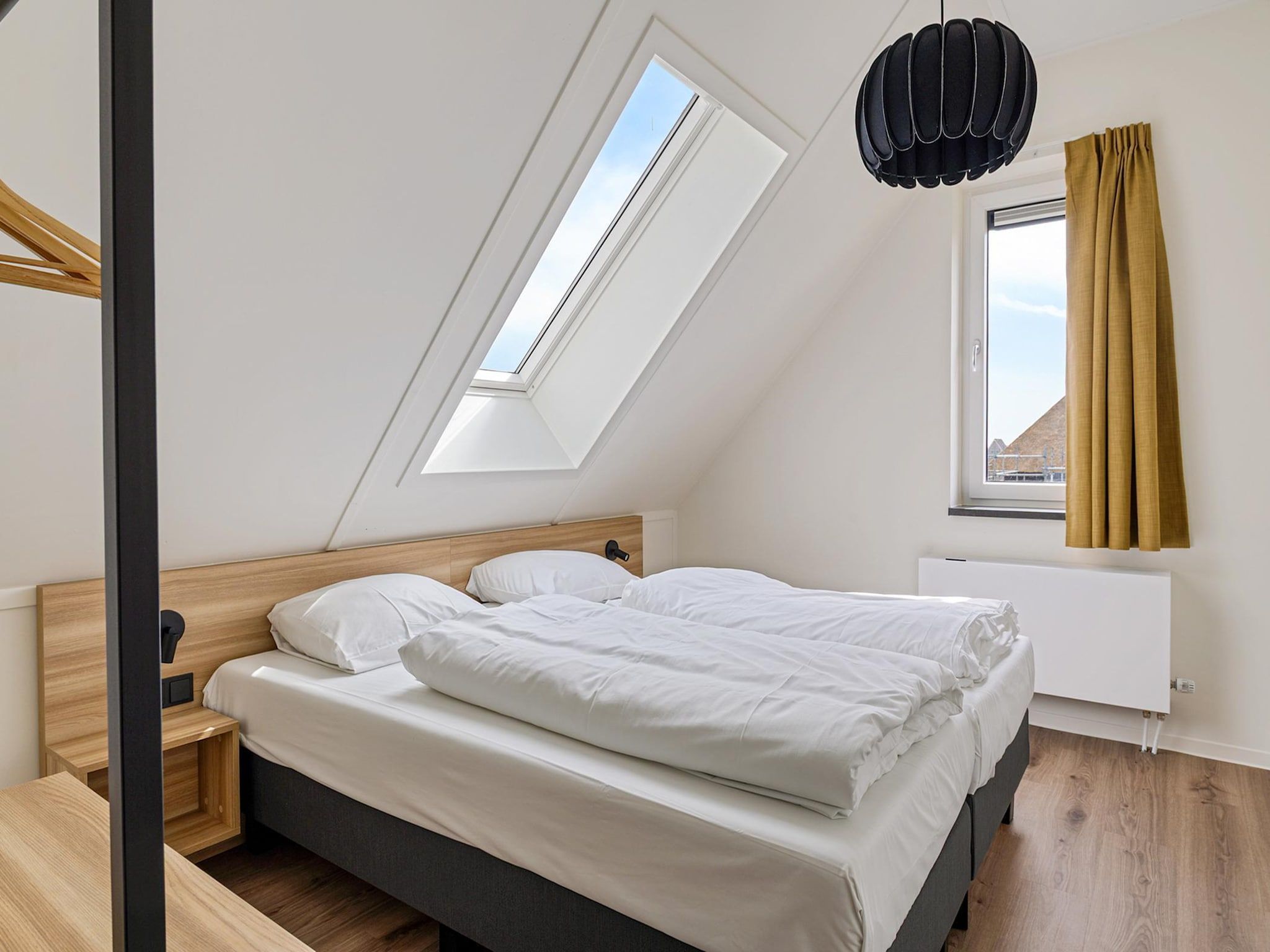 Een slaapkamer van Kleine Vliet in PS Opperdoes