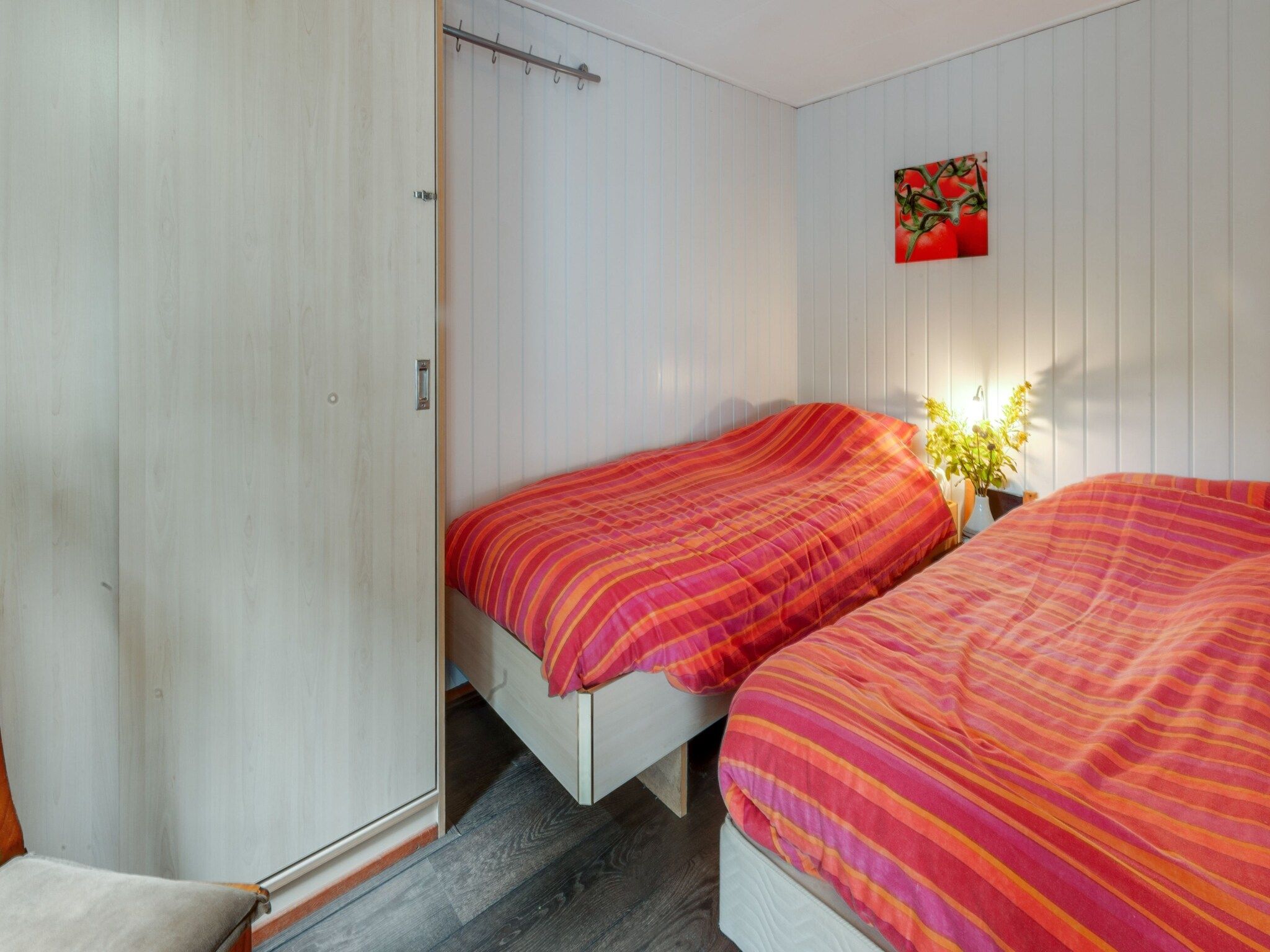 Een slaapkamer van Huisje Arti in Ommen- Stegeren
