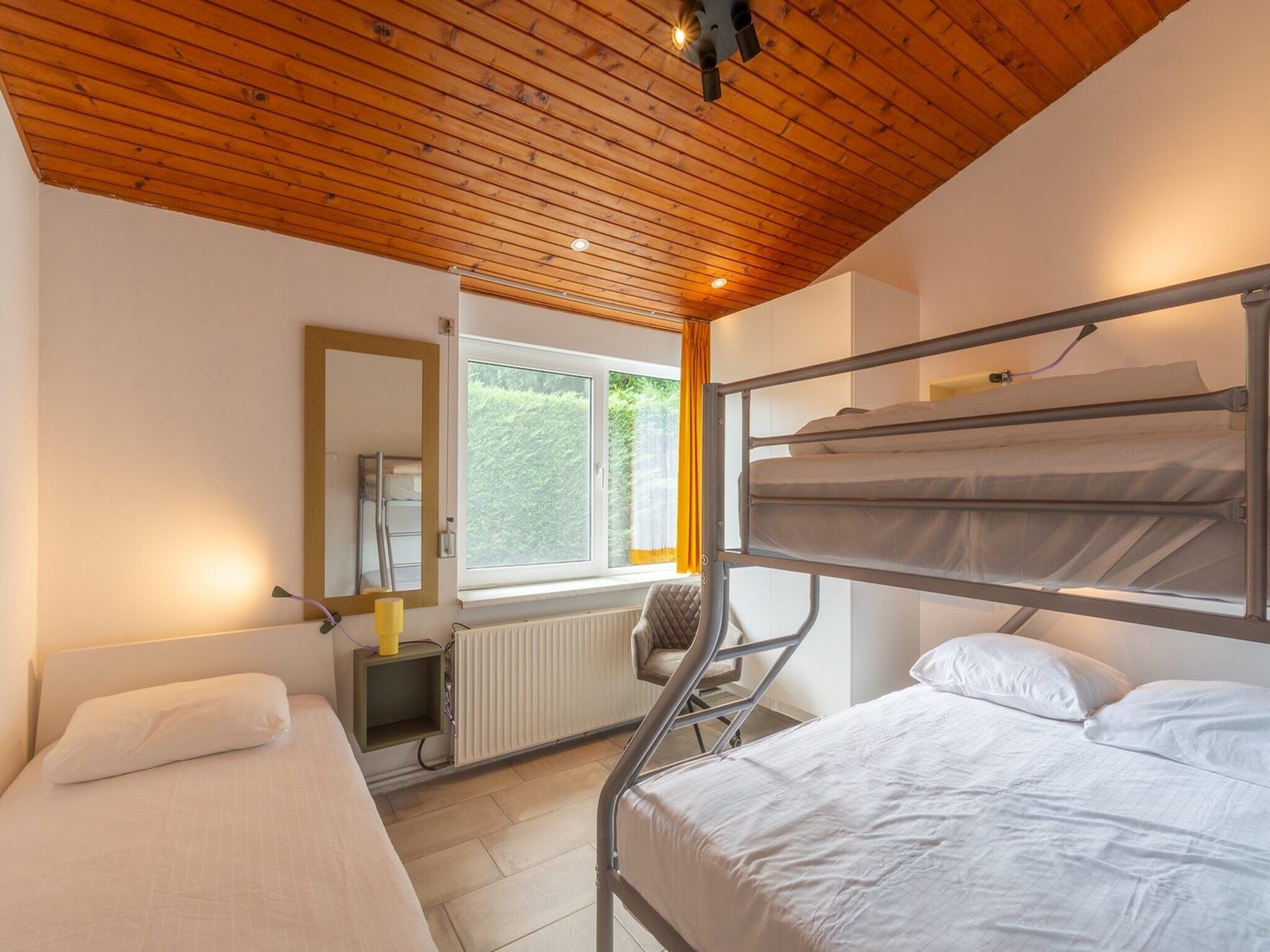Een slaapkamer van Duinland 65 in Sint Maartenszee