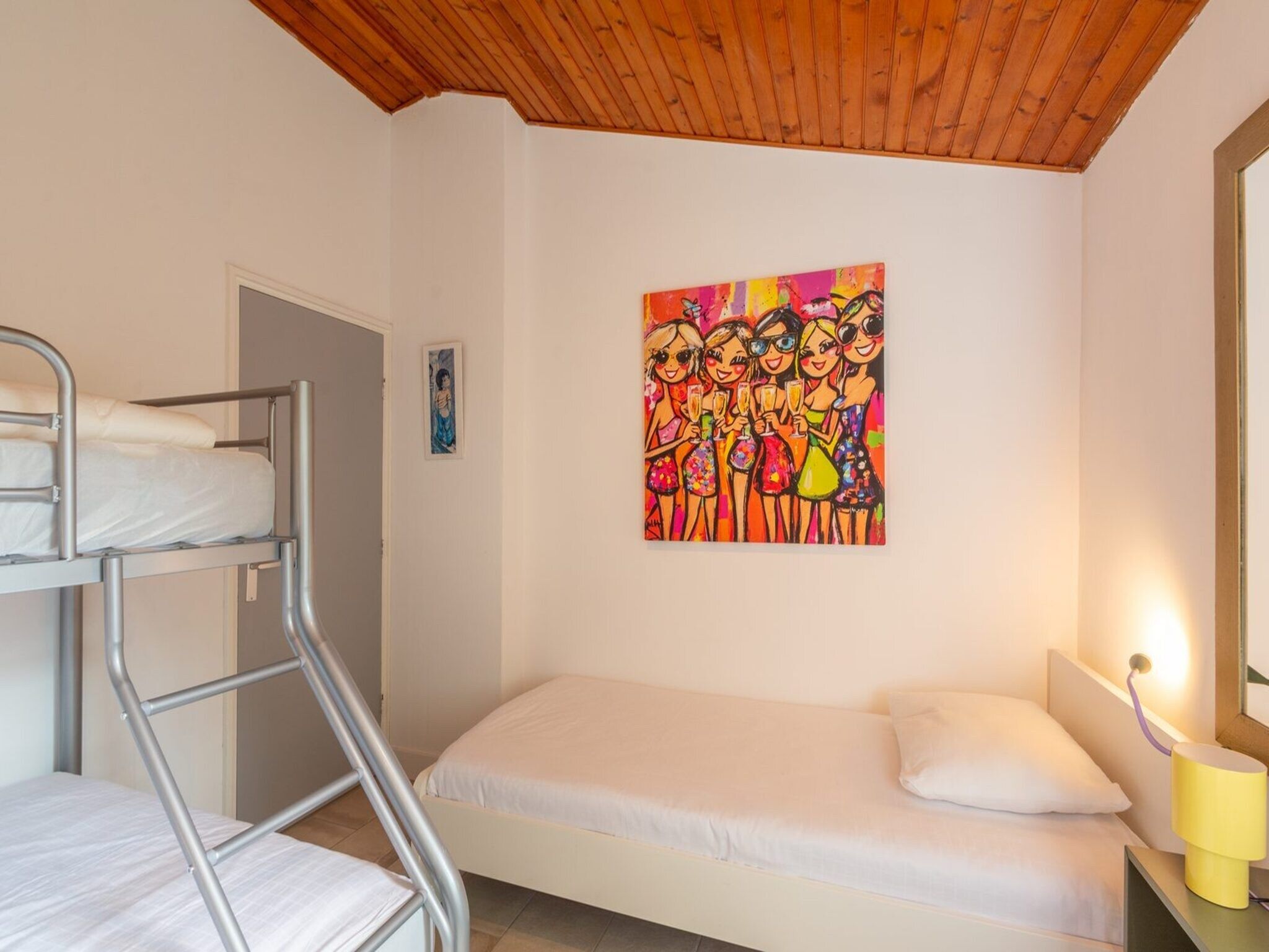 Een slaapkamer van Duinland 65 in Sint Maartenszee