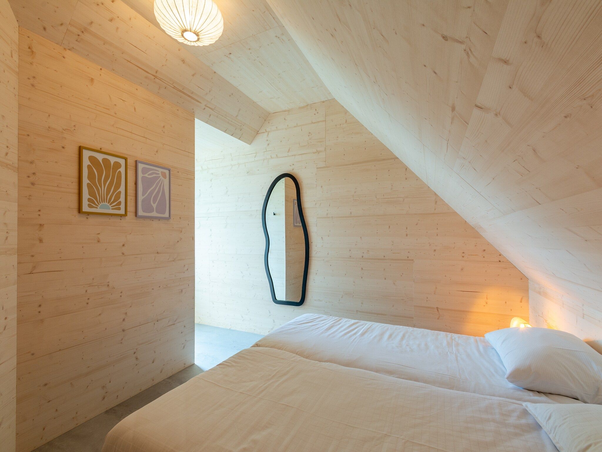Een slaapkamer van Belkmer Beachhouse in Sint Maartenszee