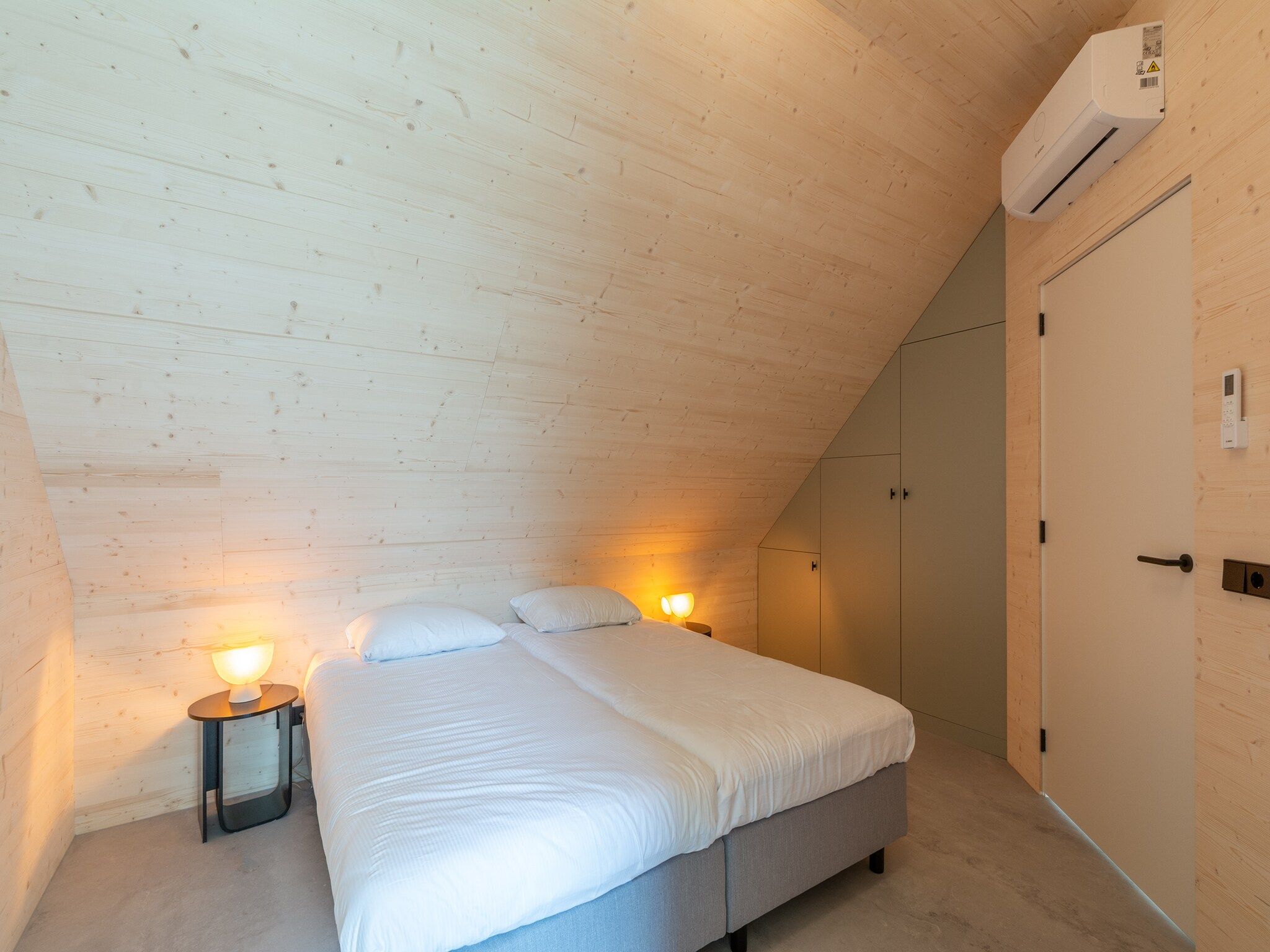 Een slaapkamer van Belkmer Beachhouse in Sint Maartenszee