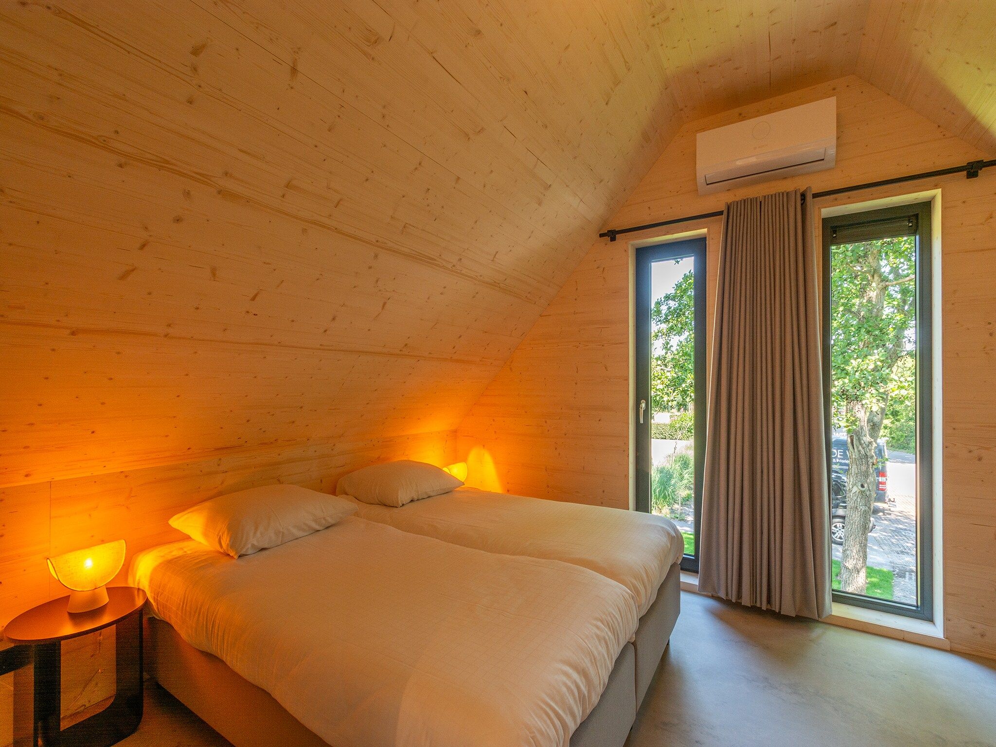 Een slaapkamer van Belkmer Beachhouse in Sint Maartenszee