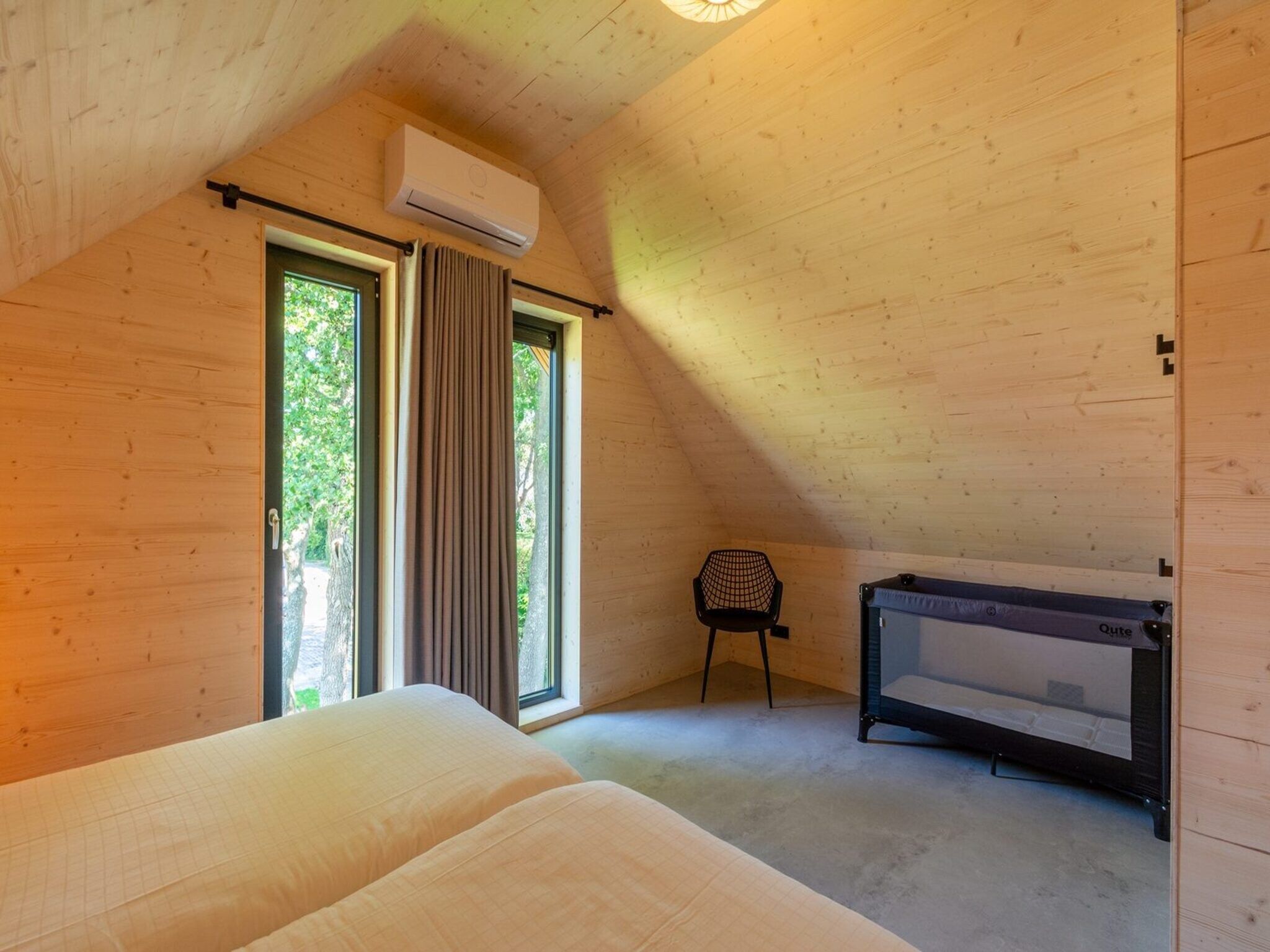 Een slaapkamer van Belkmer Beachhouse in Sint Maartenszee