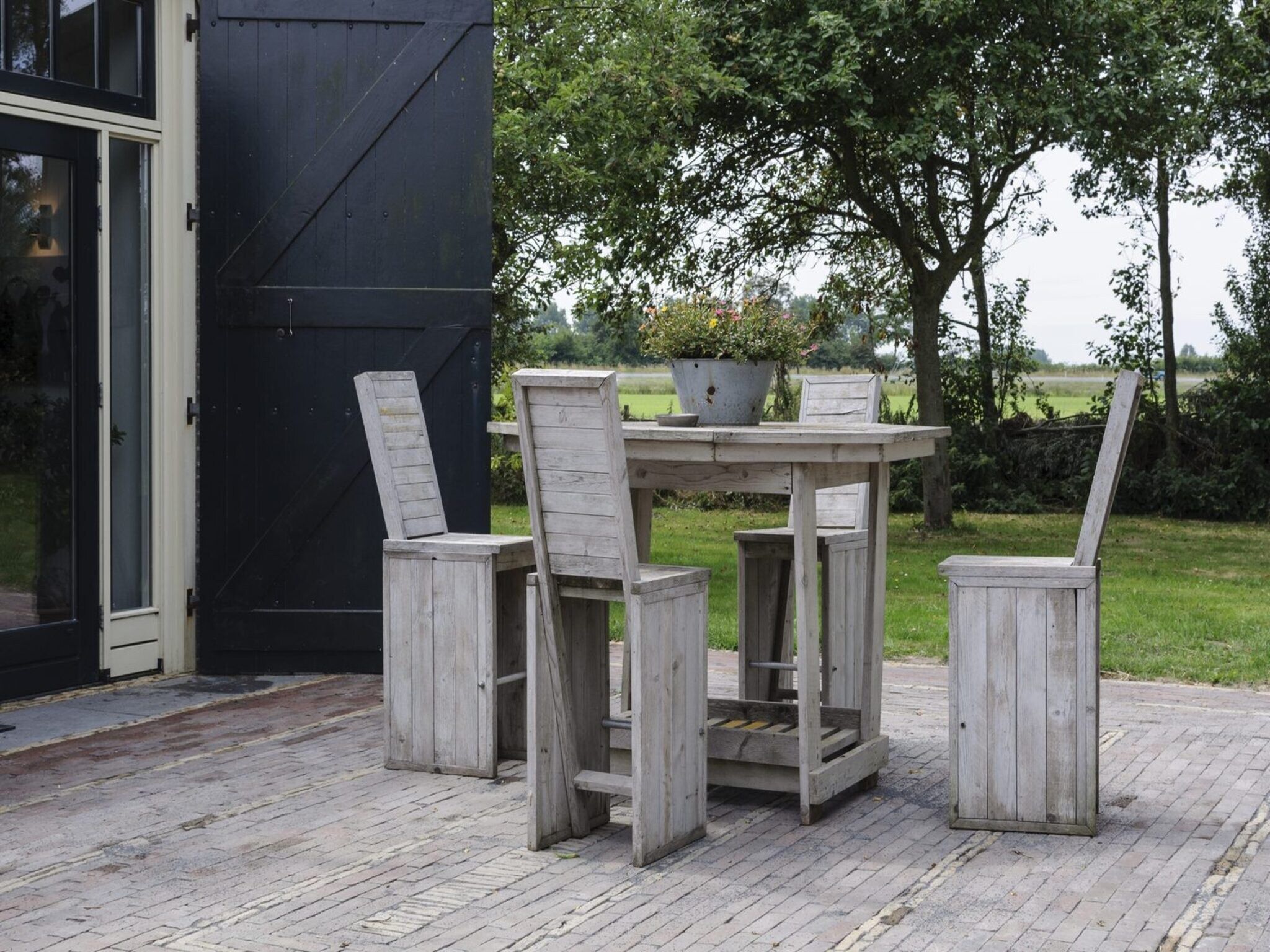 Het terras van Groepsaccomodatie - Balkenhoeve in Schagen