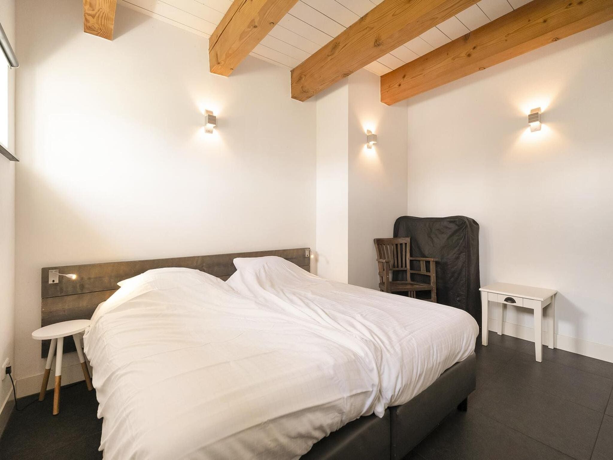 Een slaapkamer van Groepsaccomodatie - Balkenhoeve in Schagen