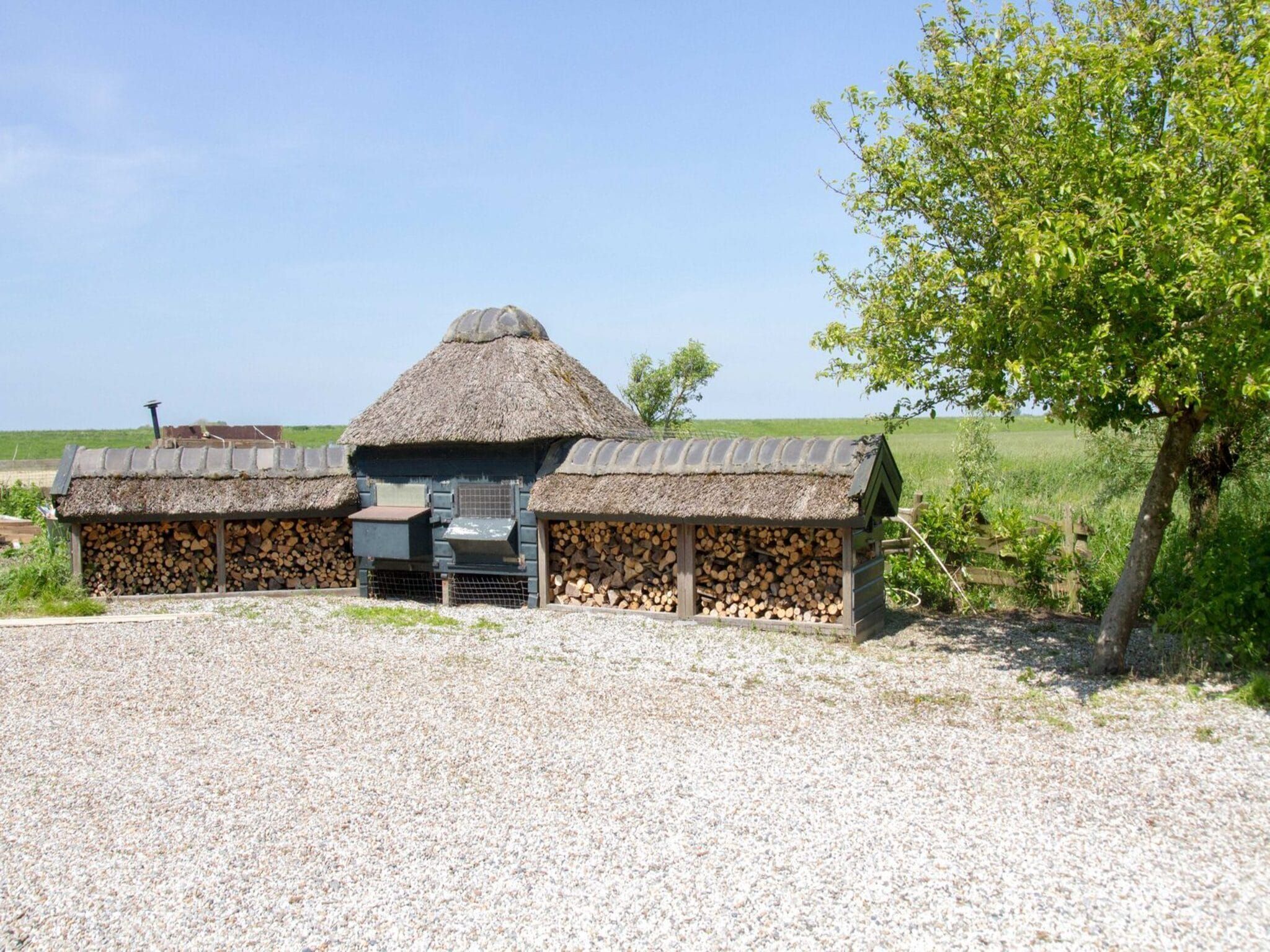 De tuin van Appartement Boerderij in Schagen