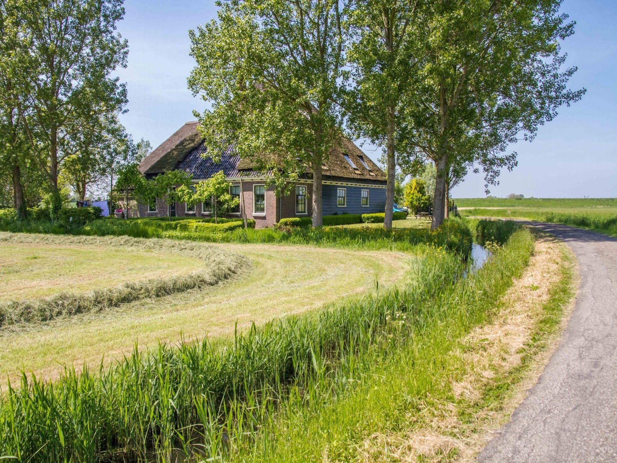 De tuin van Appartement Boerderij in Schagen