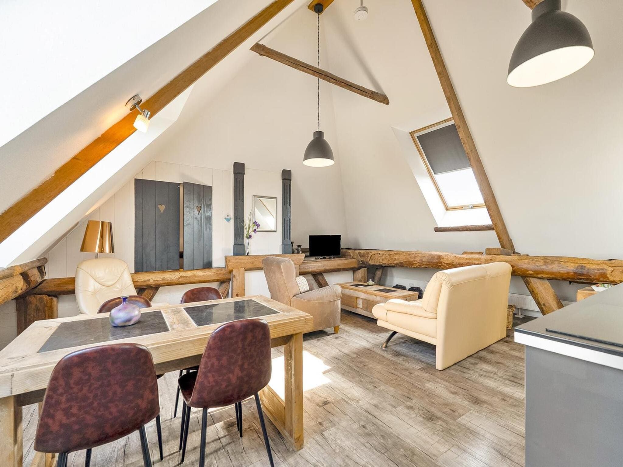 De woonkamer van Appartement Rustiek in Schagen