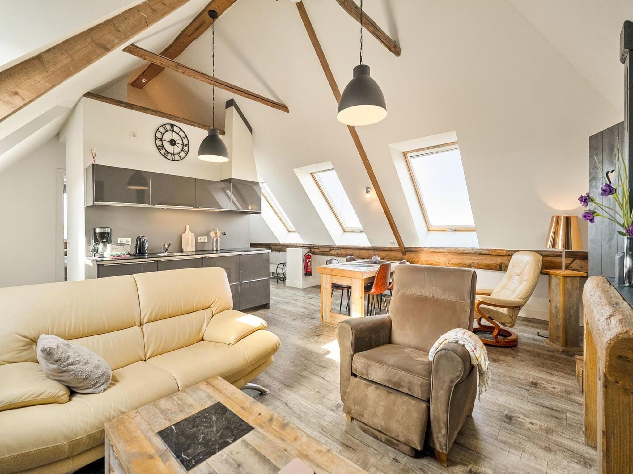 De woonkamer van Appartement Rustiek in Schagen