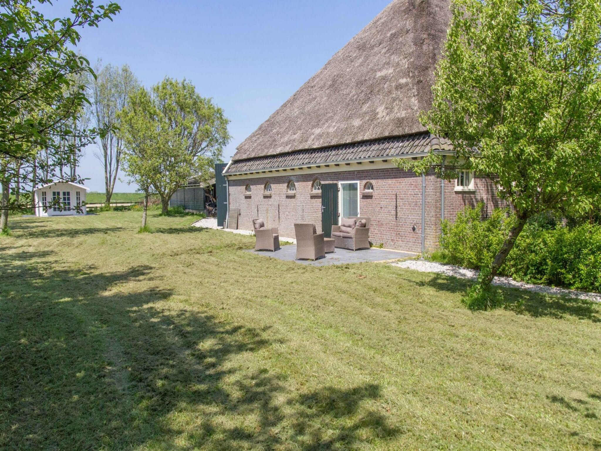 De tuin van Appartement Rustiek in Schagen