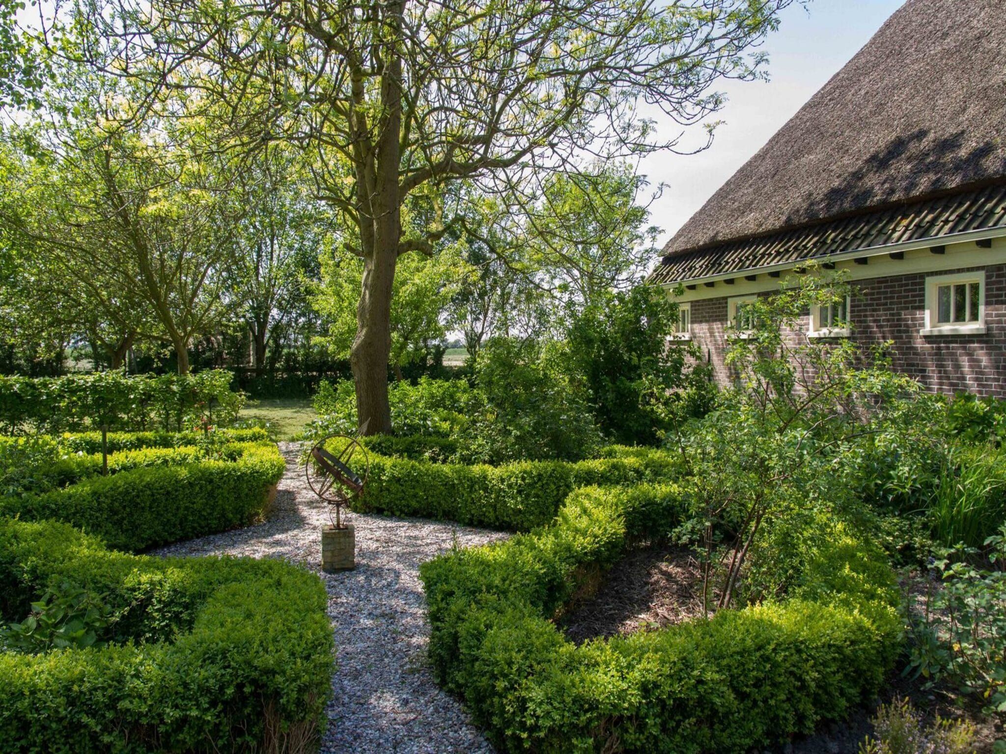 De tuin van Appartement Rustiek in Schagen