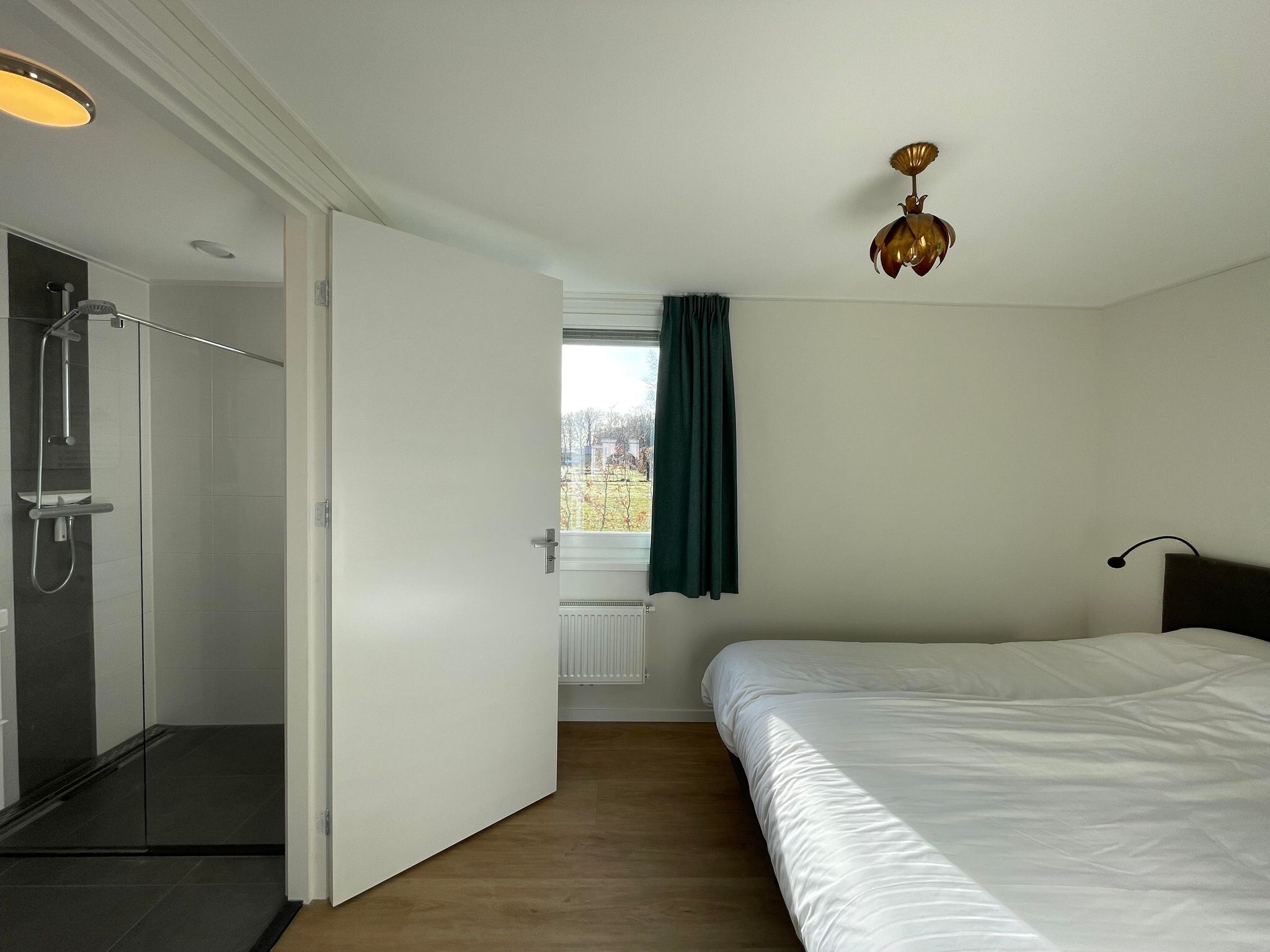 Een slaapkamer van Chaletwoning in Sint Nicolaasga