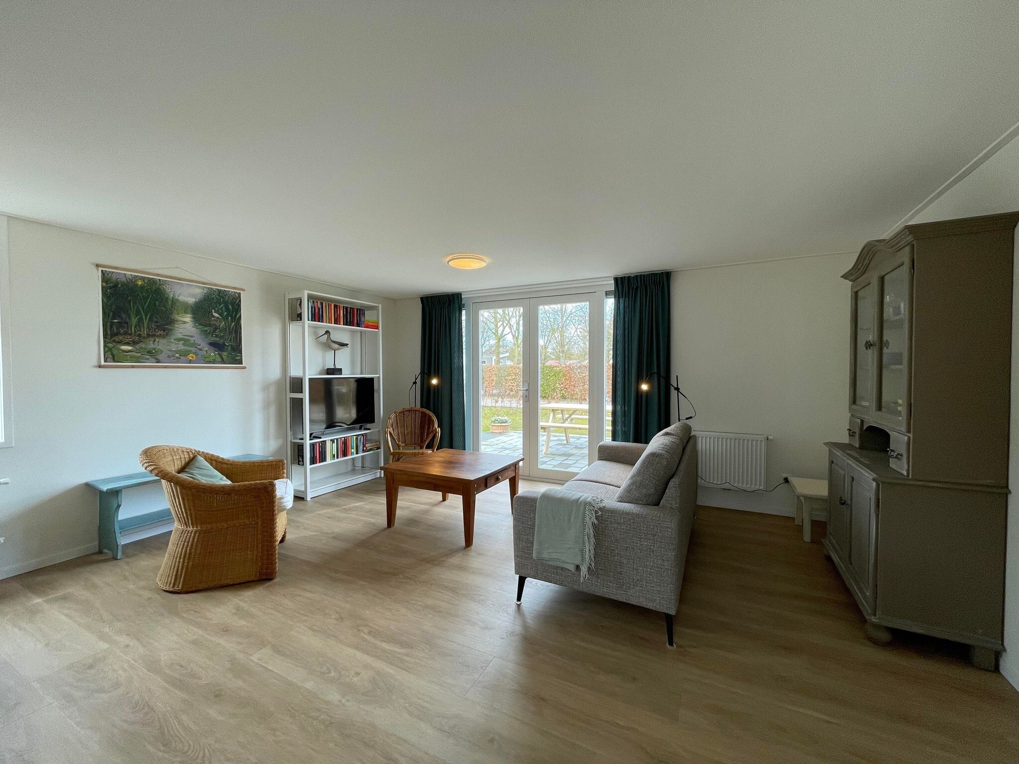 De woonkamer van Chaletwoning in Sint Nicolaasga