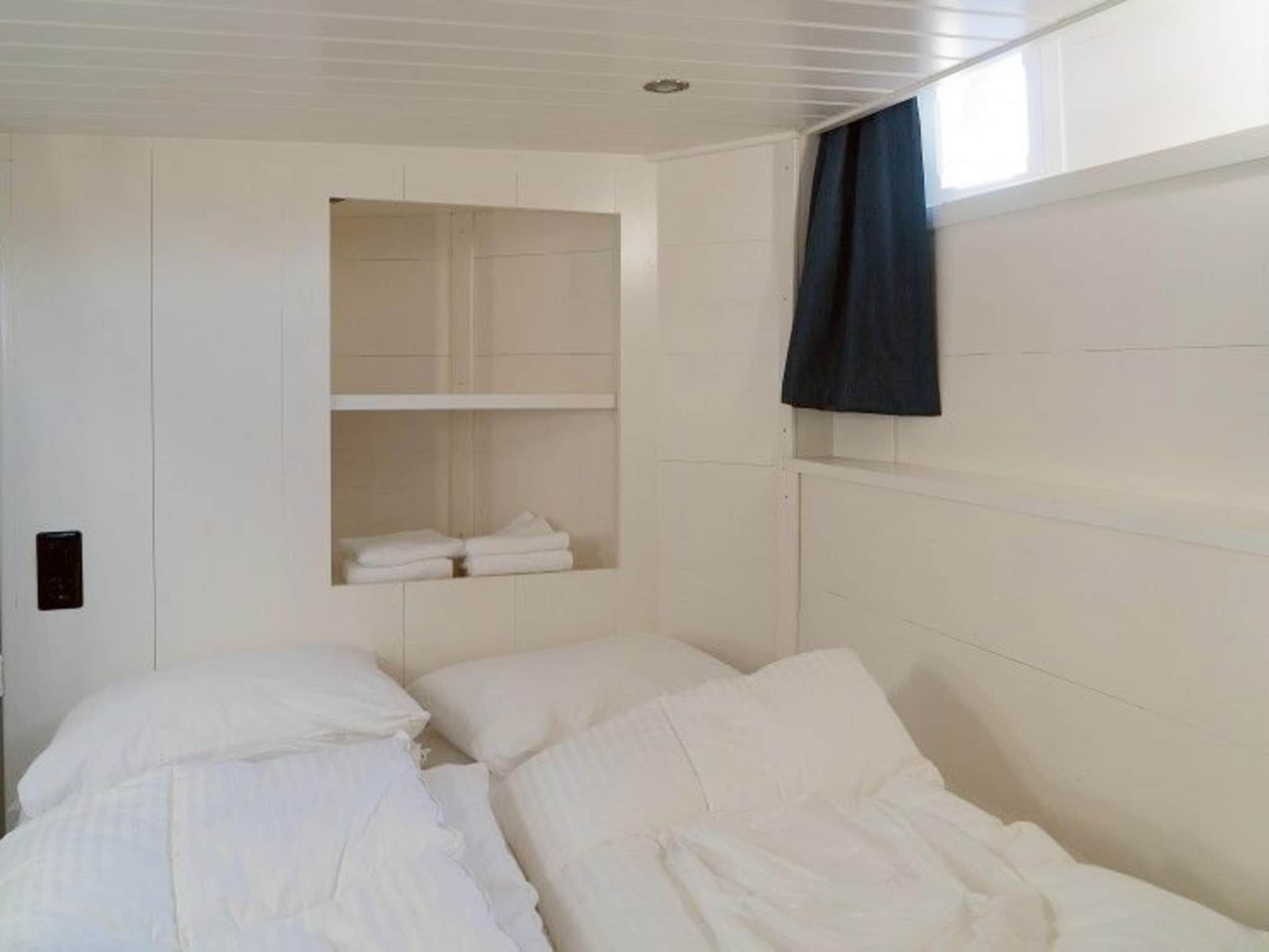Een slaapkamer van De Zwerver Naarden in Naarden