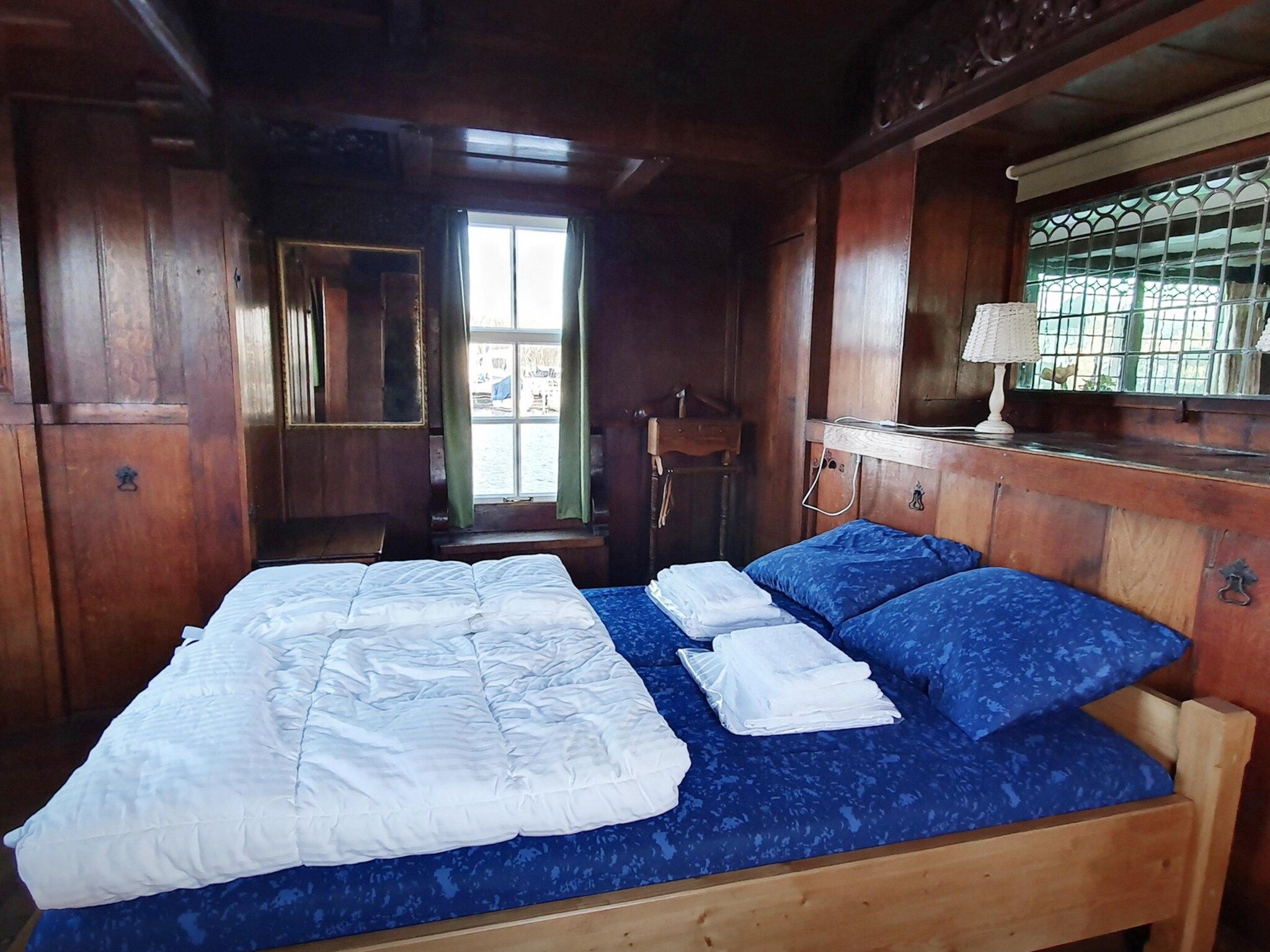 Een slaapkamer van De Zwerver Naarden in Naarden