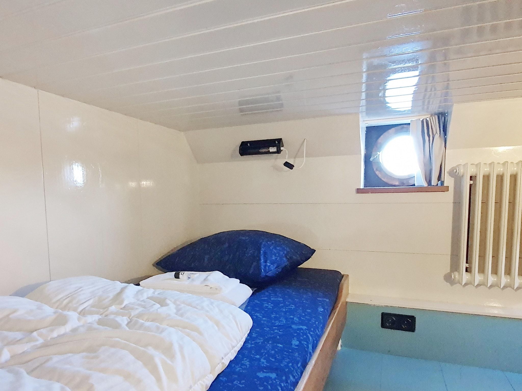 Een slaapkamer van De Zwerver Naarden in Naarden
