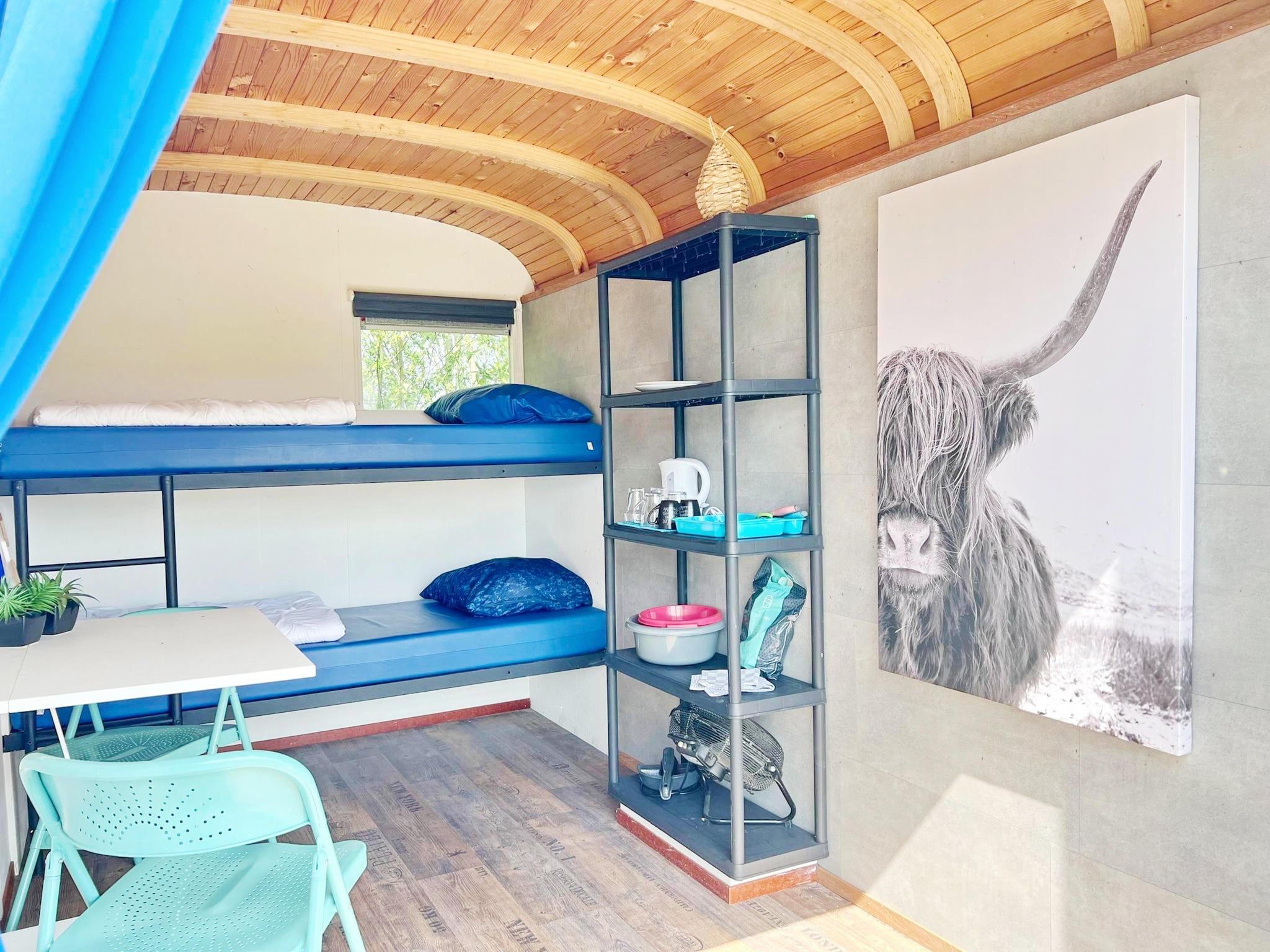 Een slaapkamer van Tiny Wagons Marina Muiderzand Almere (Nr 1-6) in Almere