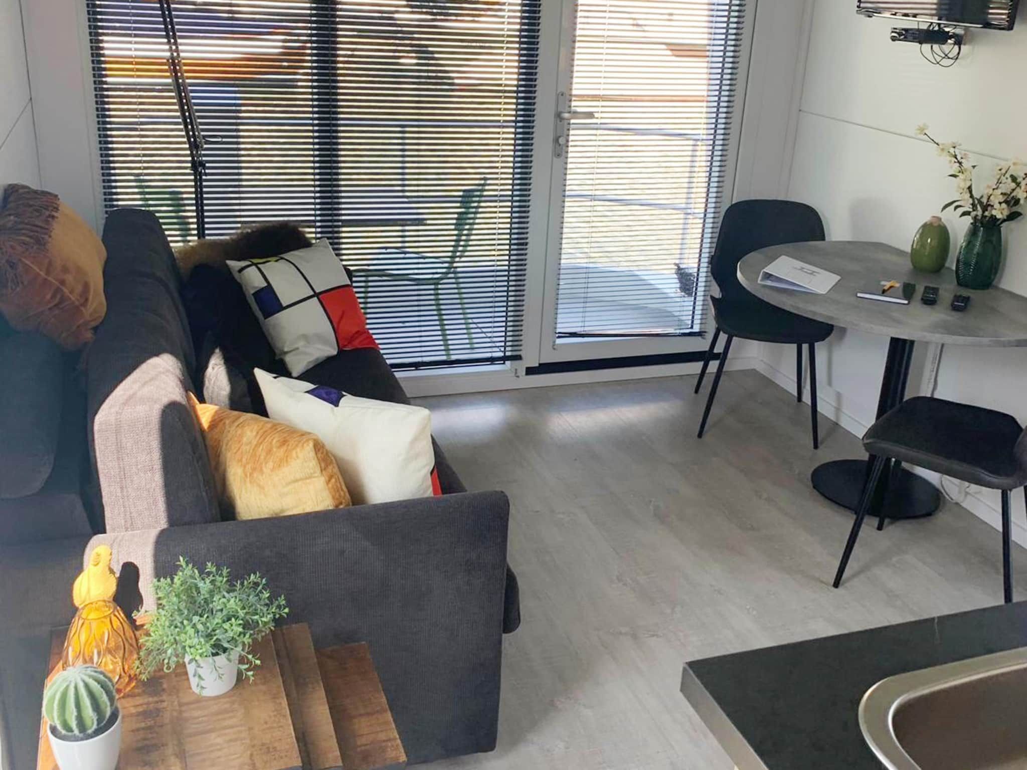 De woonkamer van Havenlodge with roof terrace and balcony (4 pers) in Amsterdam in Amsterdam